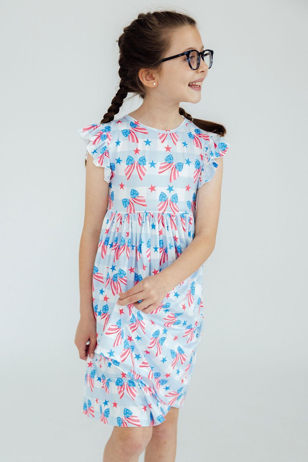 Mila & Rose ® Red, White & Bows Flutter Sleeve Twirl Dress — side view