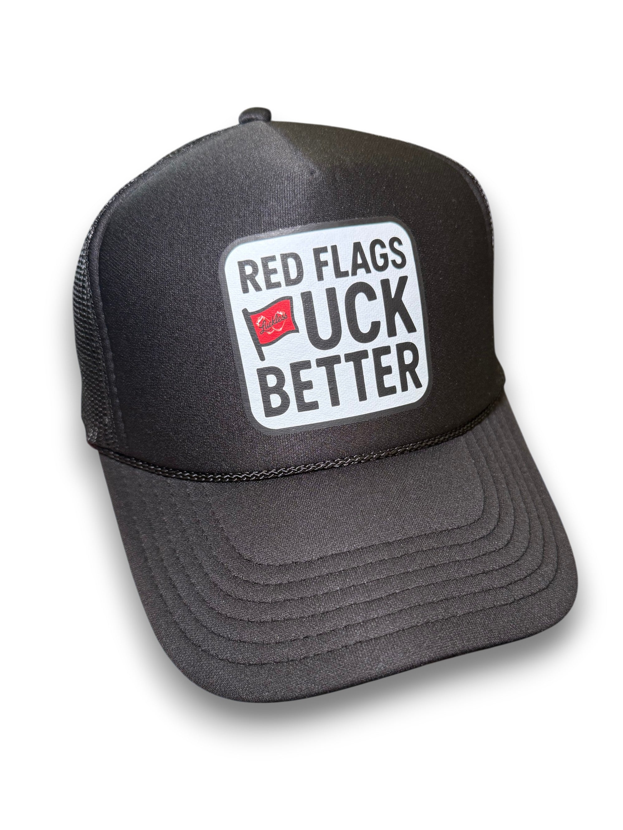 Luckless Outfitters Red Flags Fuck Better Trucker Hat — detail close-up