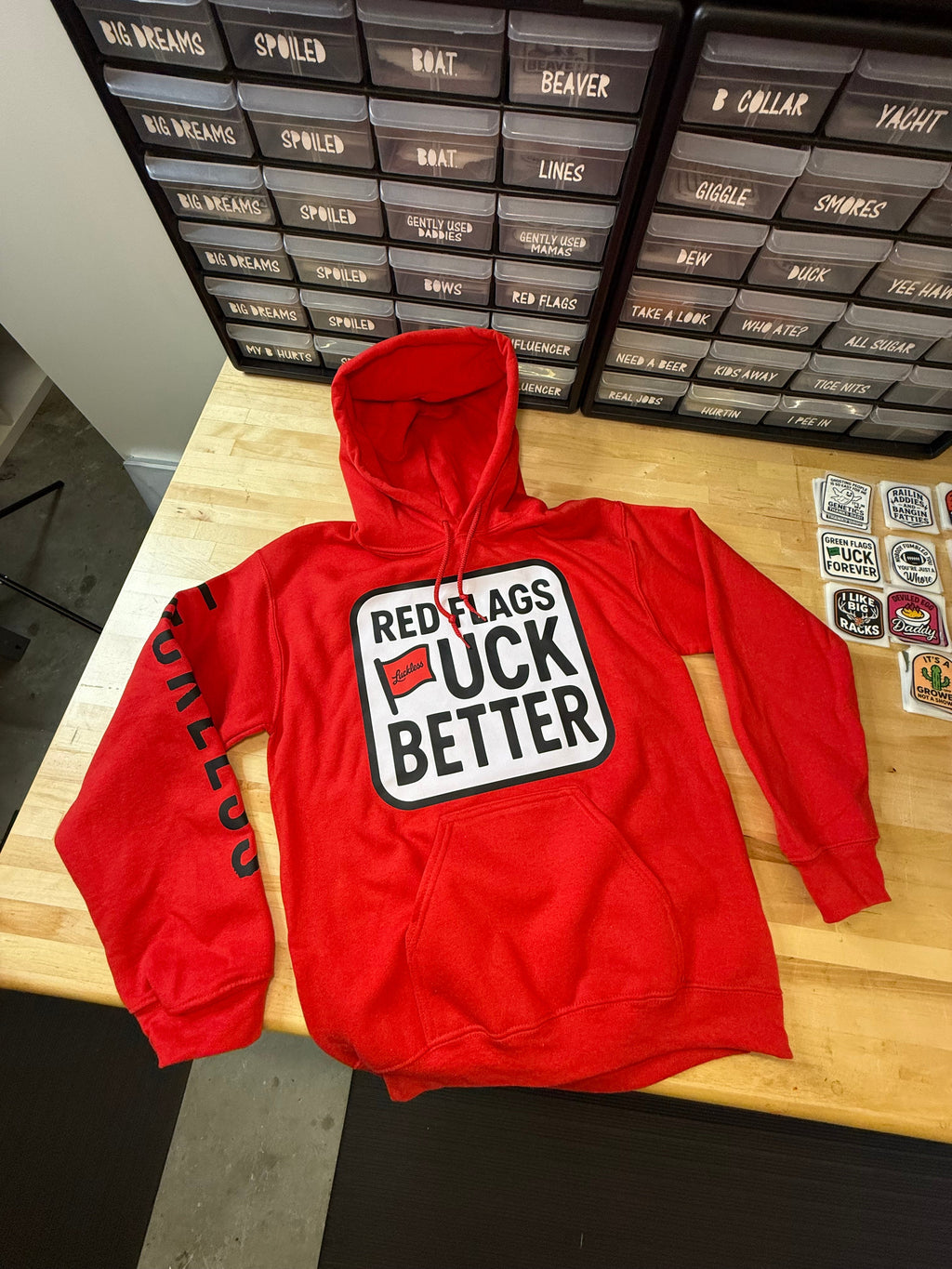 Luckless Outfitters Red Flags Fuck Better Hoodie — in-use photo