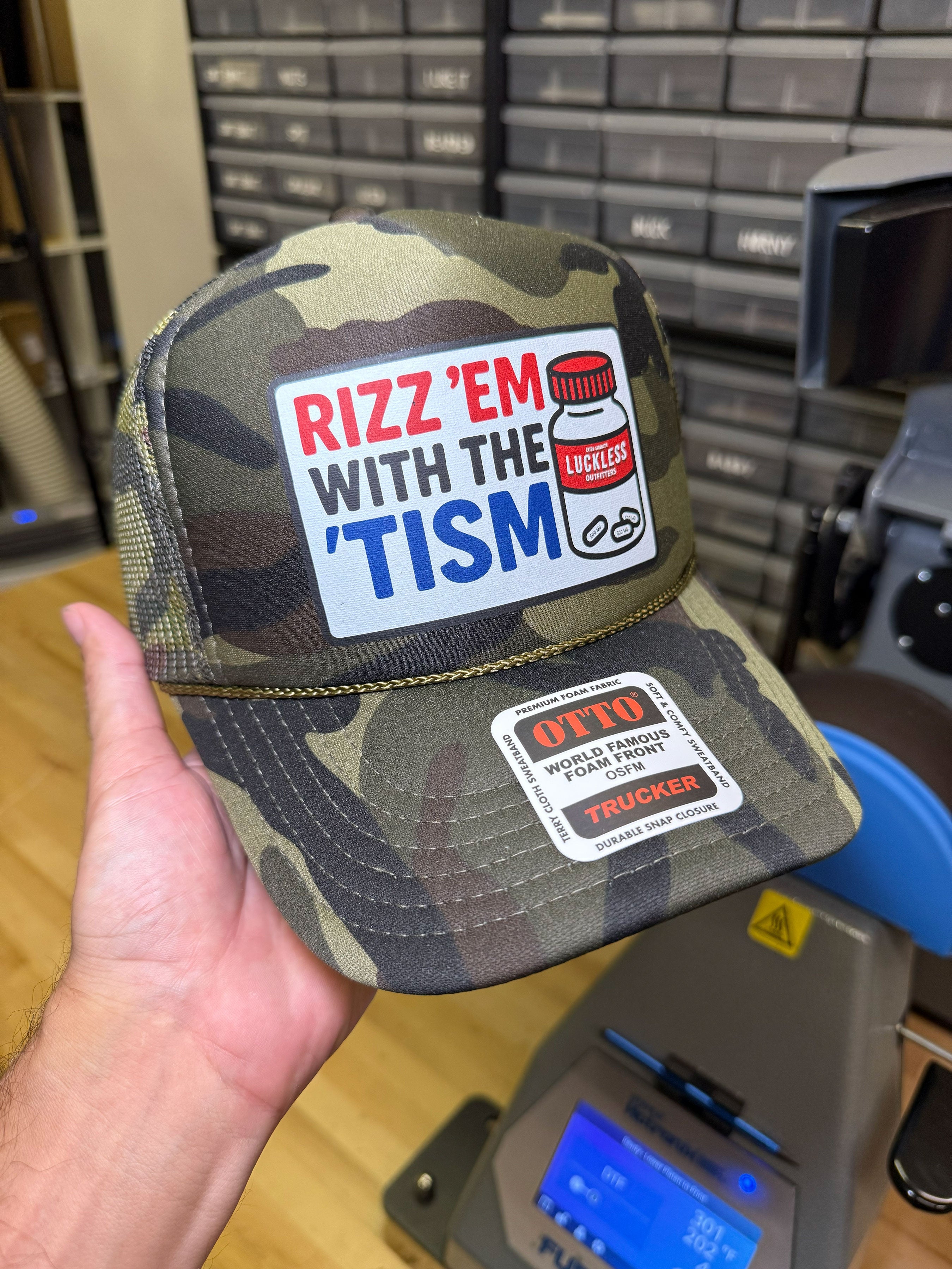 Luckless Outfitters Rizz 'Em With The 'Tism | Funny Trucker Hat — back view