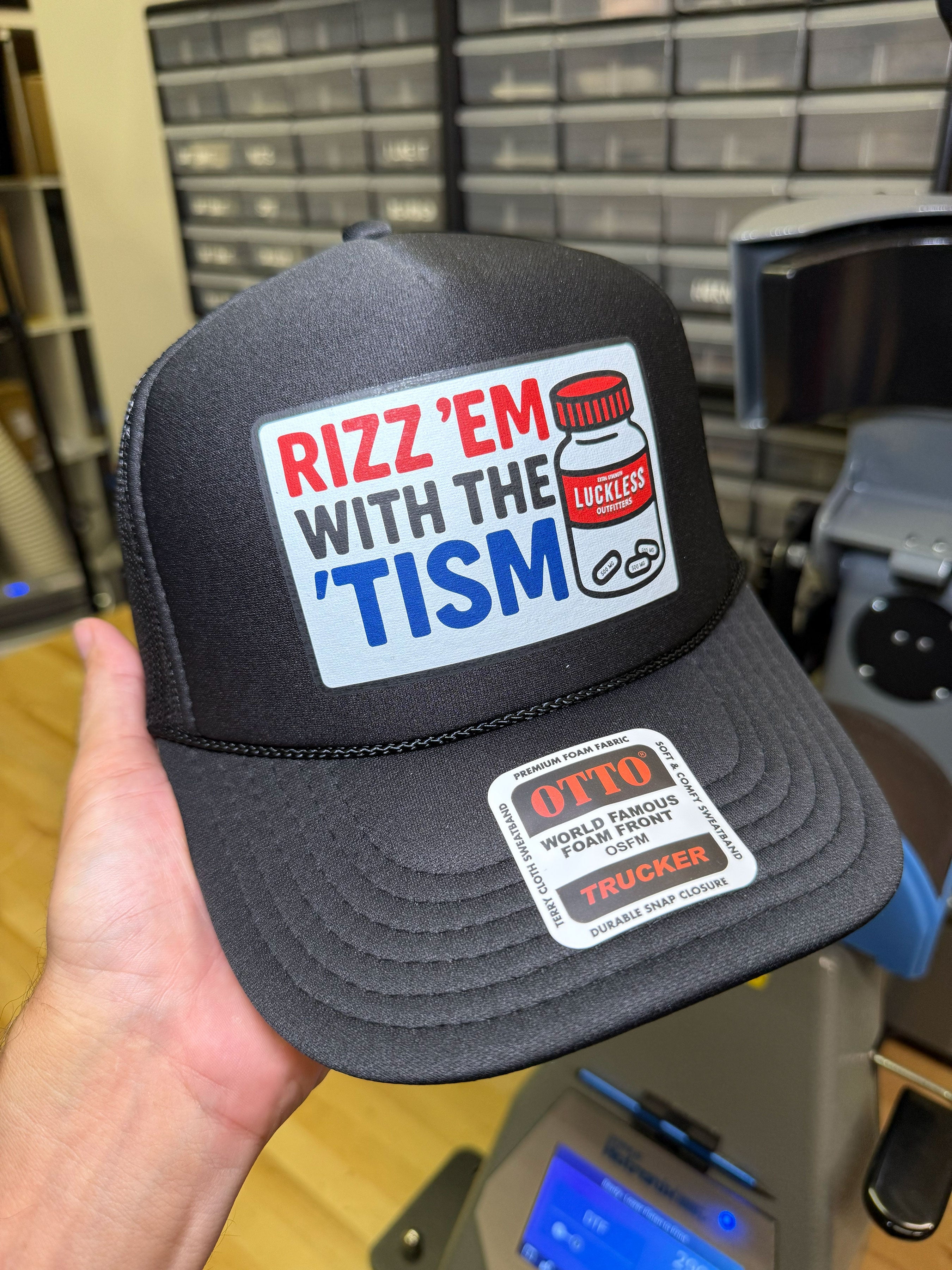 Luckless Outfitters Rizz 'Em With The 'Tism | Funny Trucker Hat — alternative angle