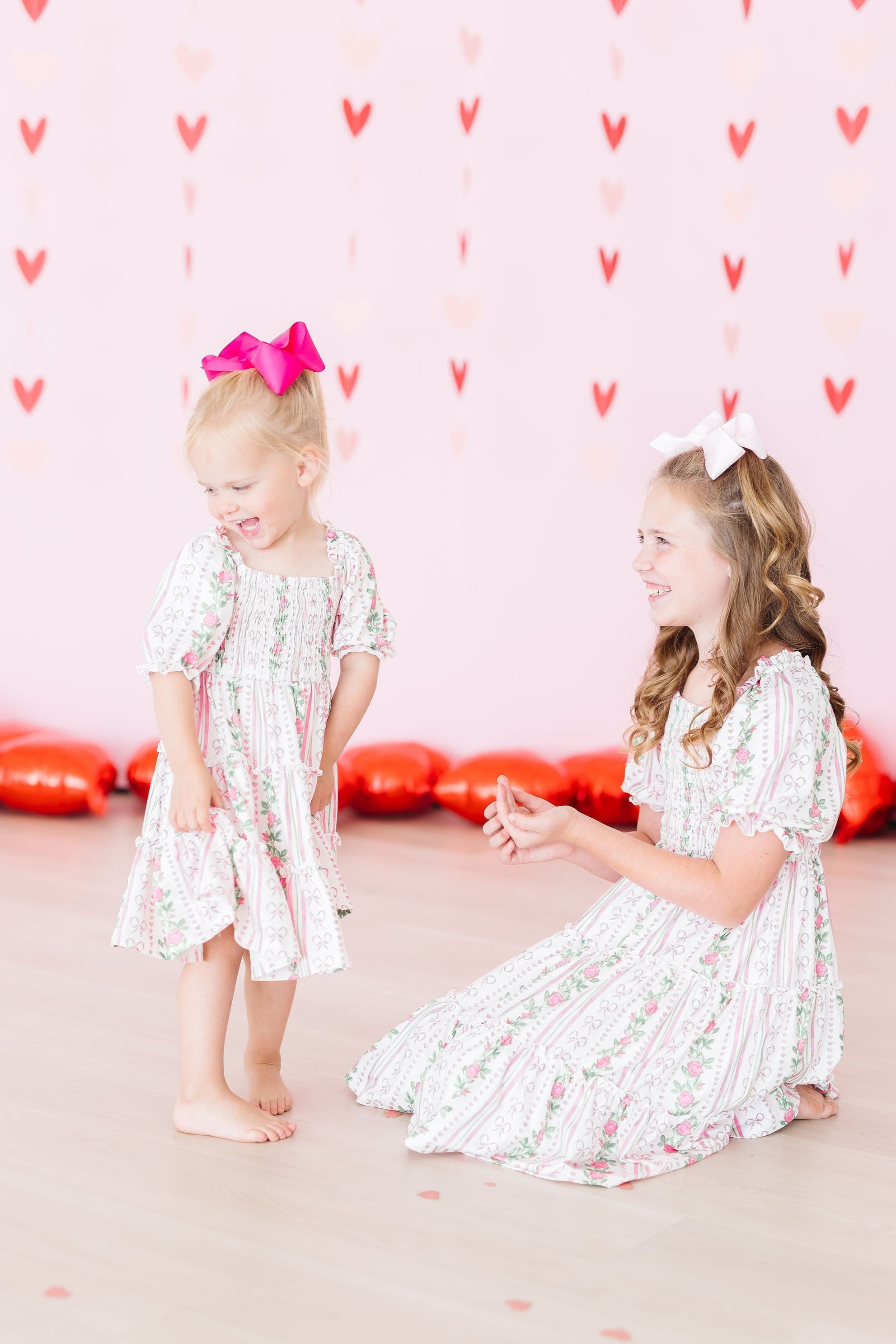 Mila & Rose ® Rosebud Bows Smocked Ruffle Dress — detail close-up
