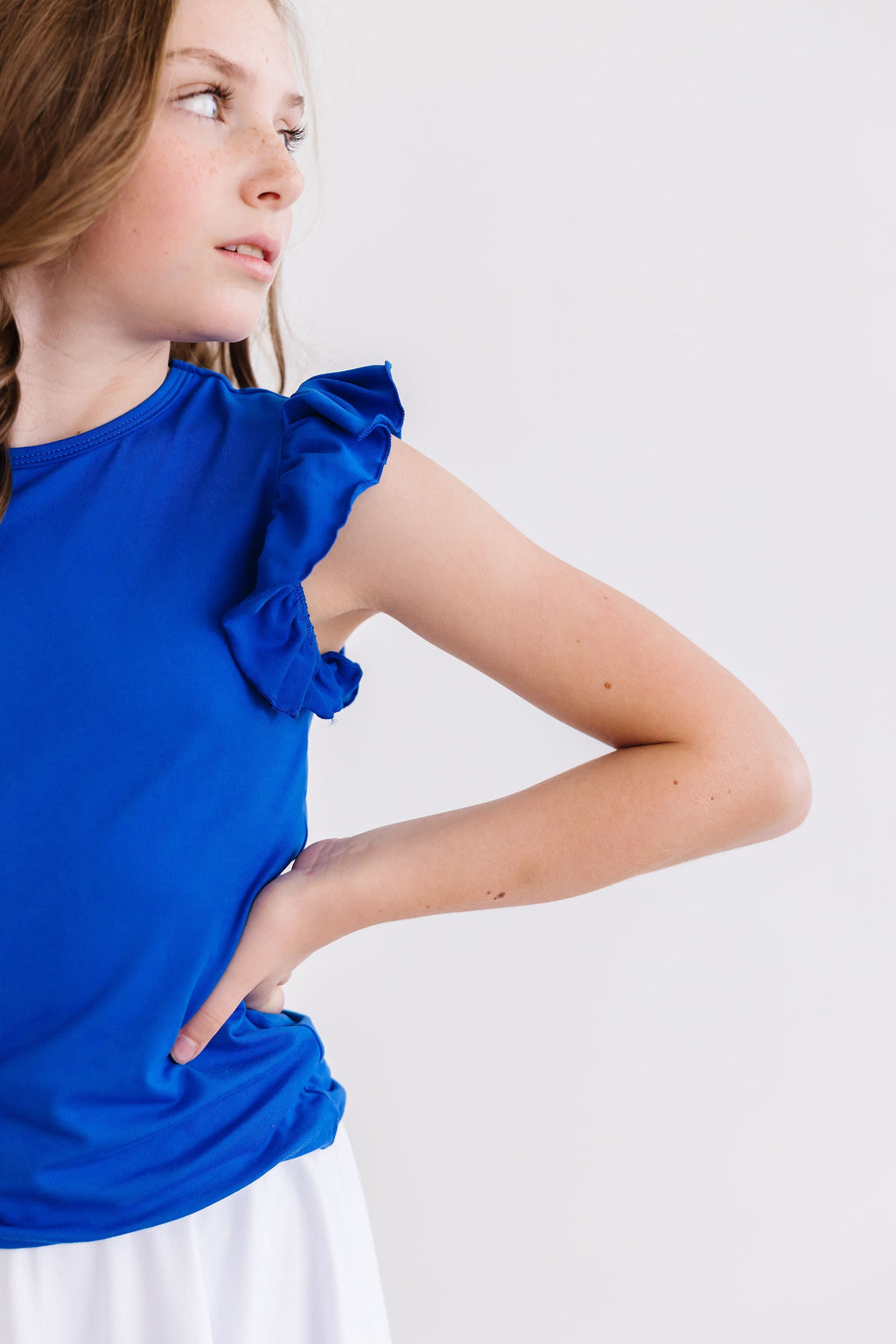 Mila & Rose ® Royal Blue S/S Ruffle Tee — lifestyle context