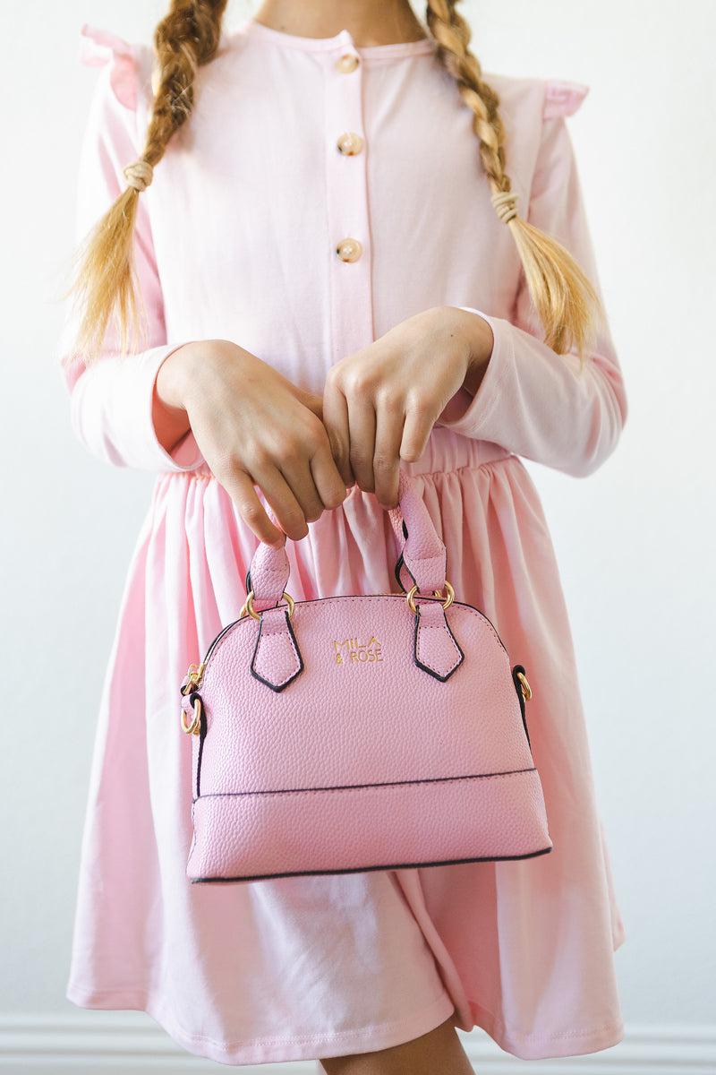 Mila & Rose ® Bubblegum Pink Girl's Crossbody Purse — lifestyle context