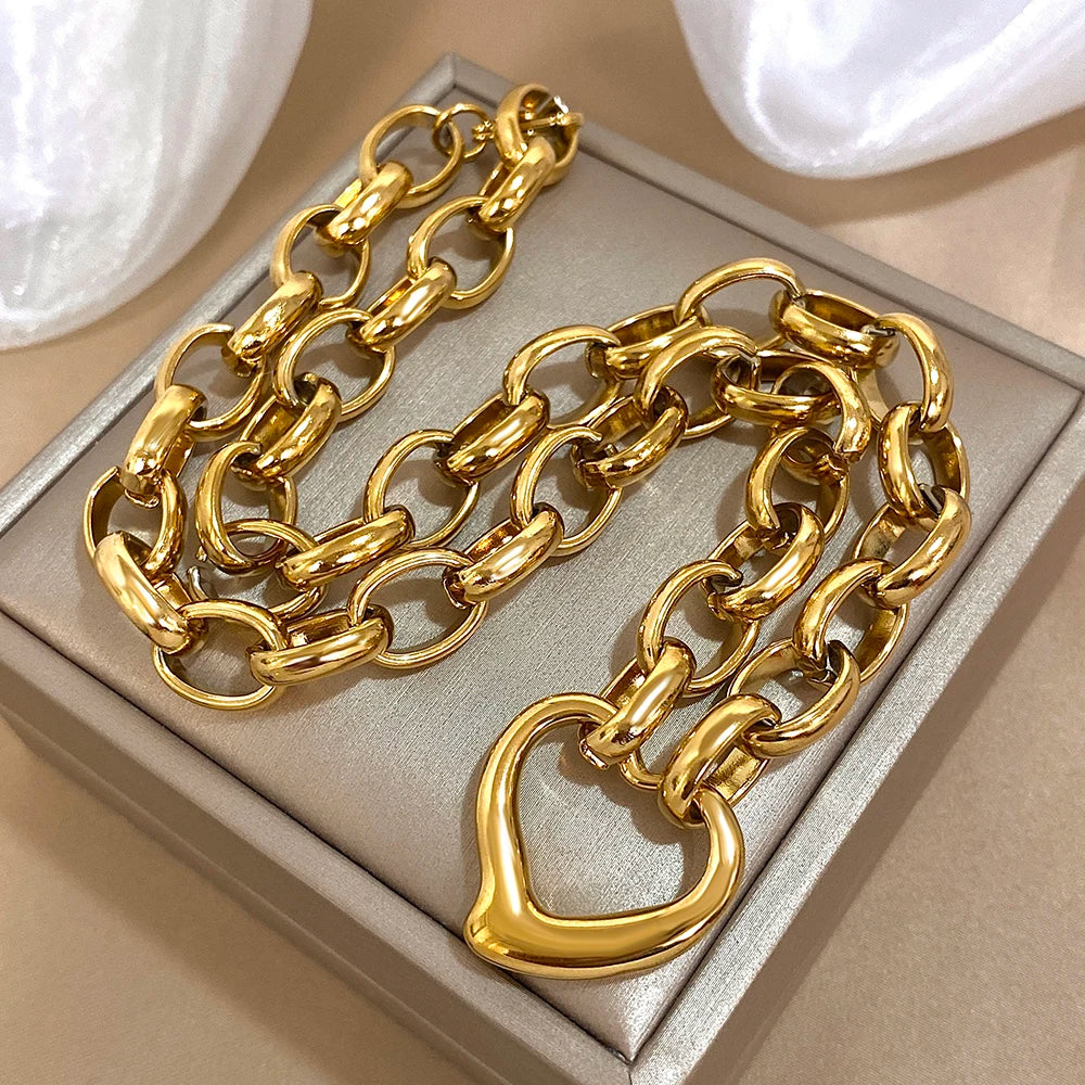 MyClosetAid Golden Stainless Steel Irregular Hollow Heart Pendant Necklace — lifestyle context