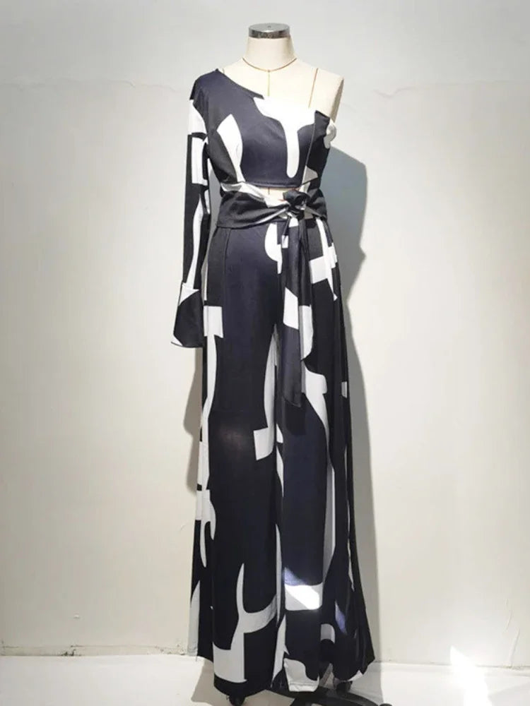 Envy NYC Envy NYC Dynasty Wide Leg Jumpsuit — Envy NYC branding close-up