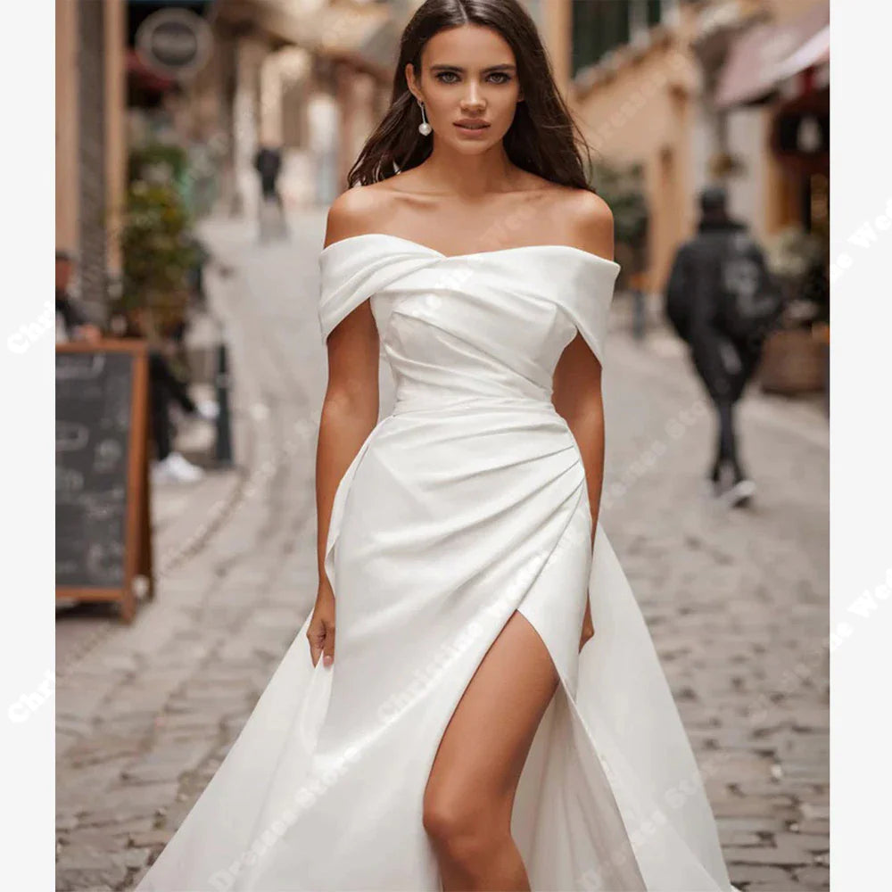 Envy NYC Envy NYC Boho Satin Off The Shoulder Wedding Dress — construction detail