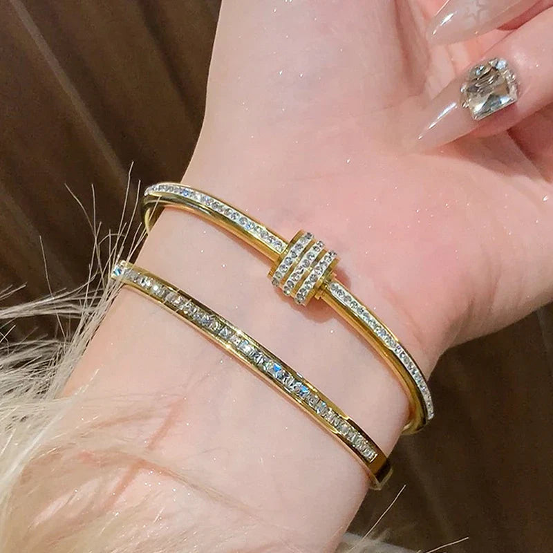 Envy NYC Envy NYC Designer 18K Titanium Steel Bracelet — Envy NYC branding close-up