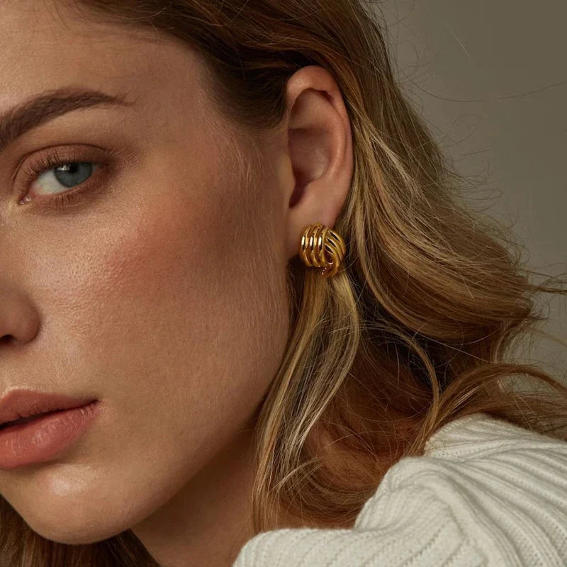 SORI STYLE Three-Layer Textured Knot Earrings for Women — lifestyle context