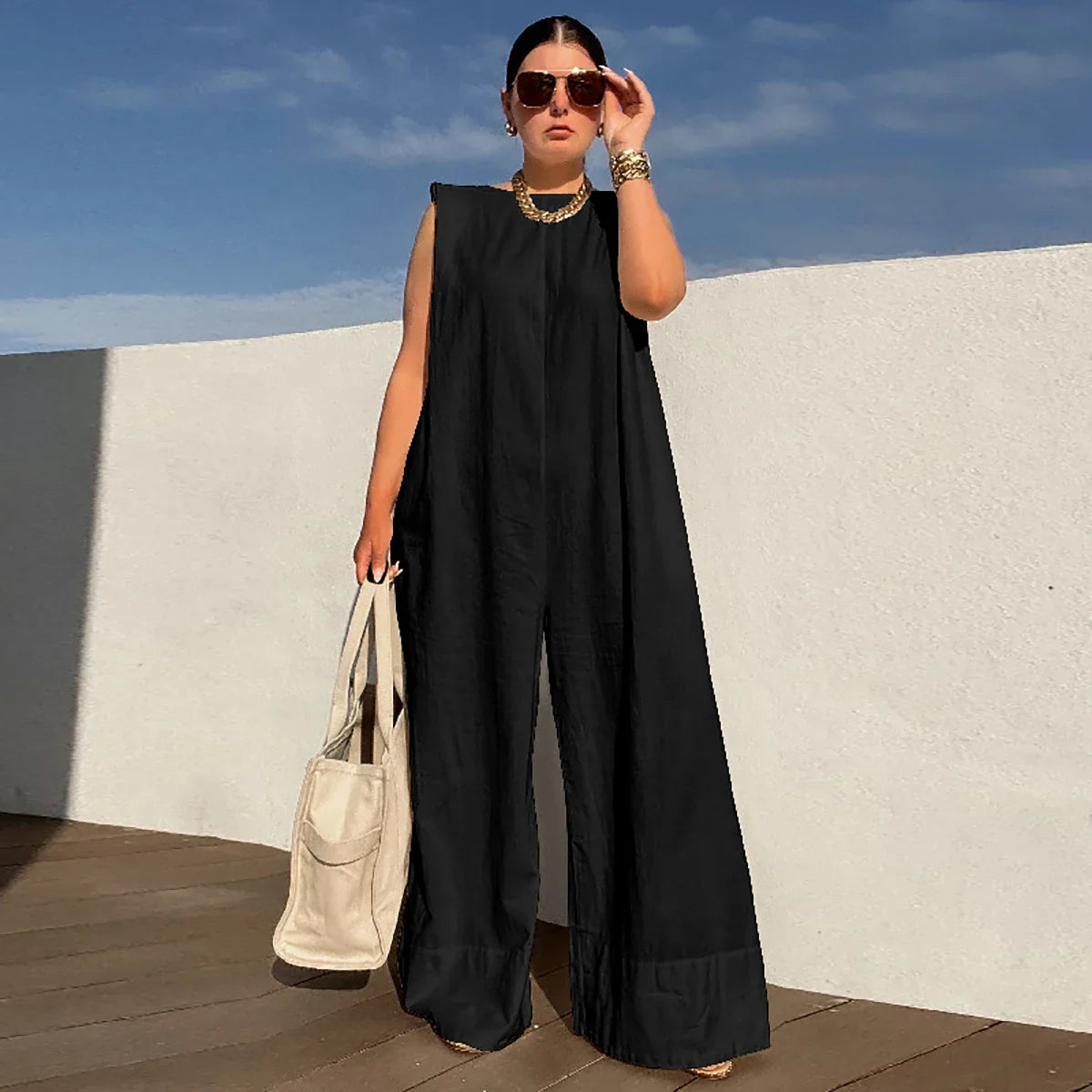 Envy NYC Envy NYC Sleeveless Wide Leg Fitness Jumpsuit — lifestyle worn / used context