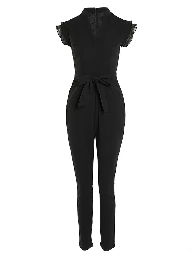 Envy NYC Envy NYC Autumn Floral Lace Jumpsuit With Belt — Envy NYC branding close-up
