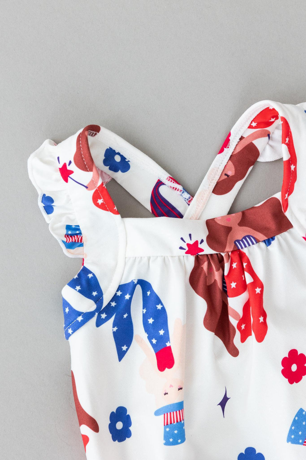 Mila & Rose ® SALE Mer-Made in the USA Ruffle Cross Back Romper — side view