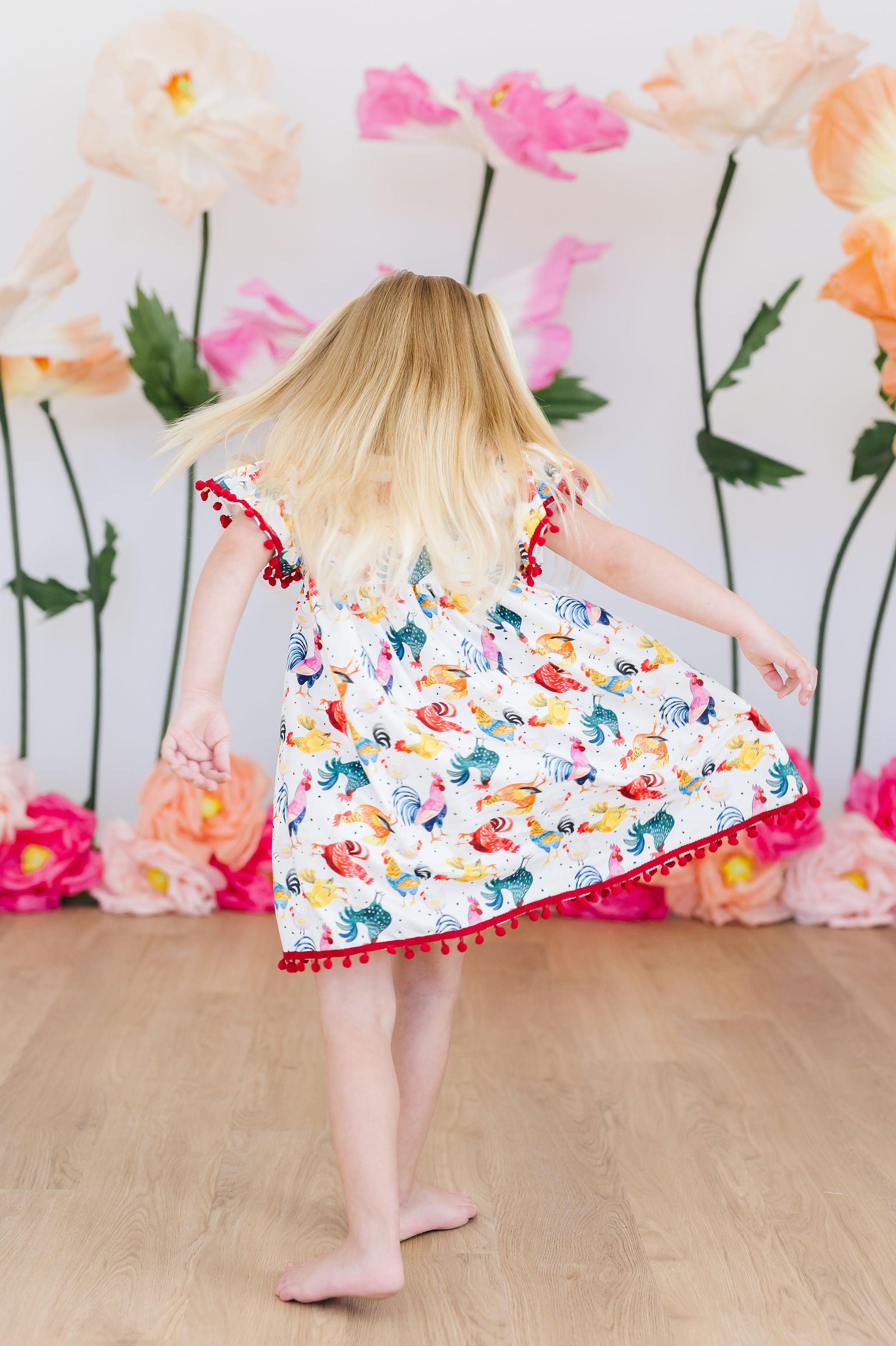 Mila & Rose ® Rooster Pom Pom Dress — in-use photo
