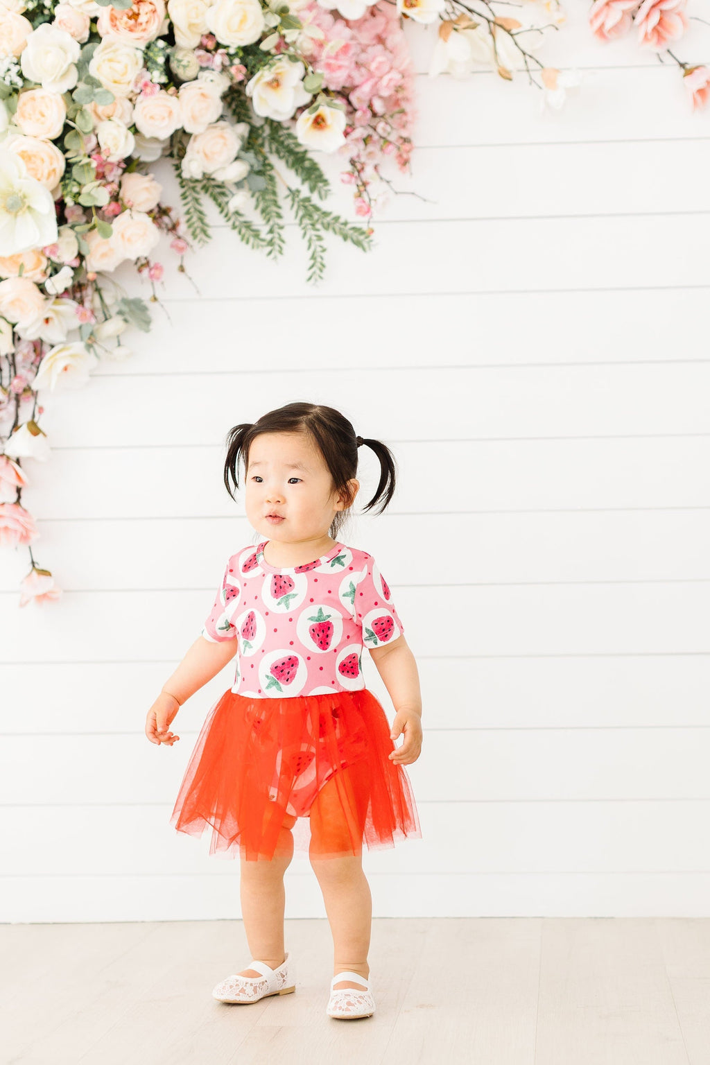 Mila & Rose ® SALE Strawberry Fields Tutu Bodysuit — lifestyle context