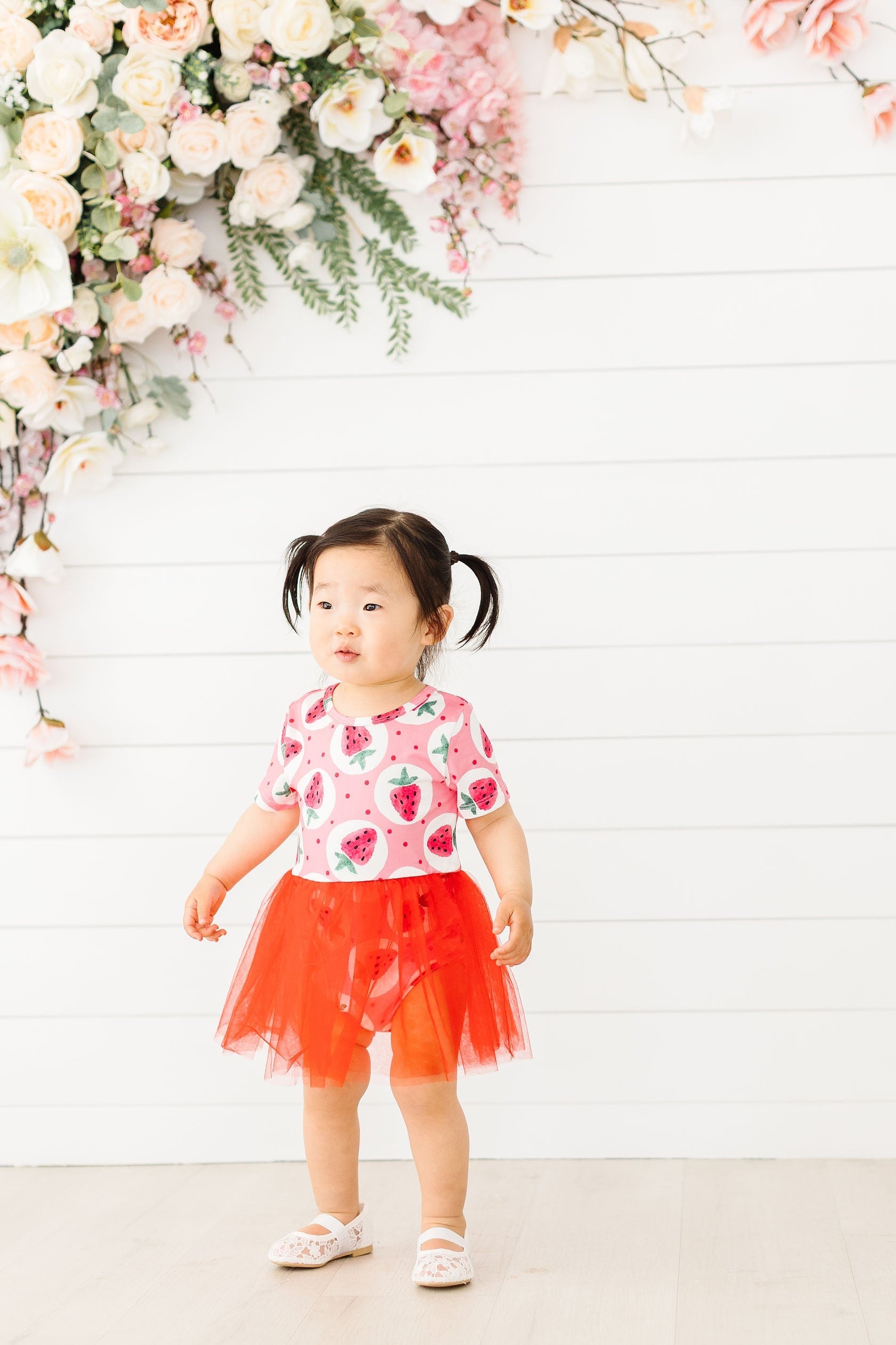Mila & Rose ® SALE Strawberry Fields Tutu Bodysuit — lifestyle context