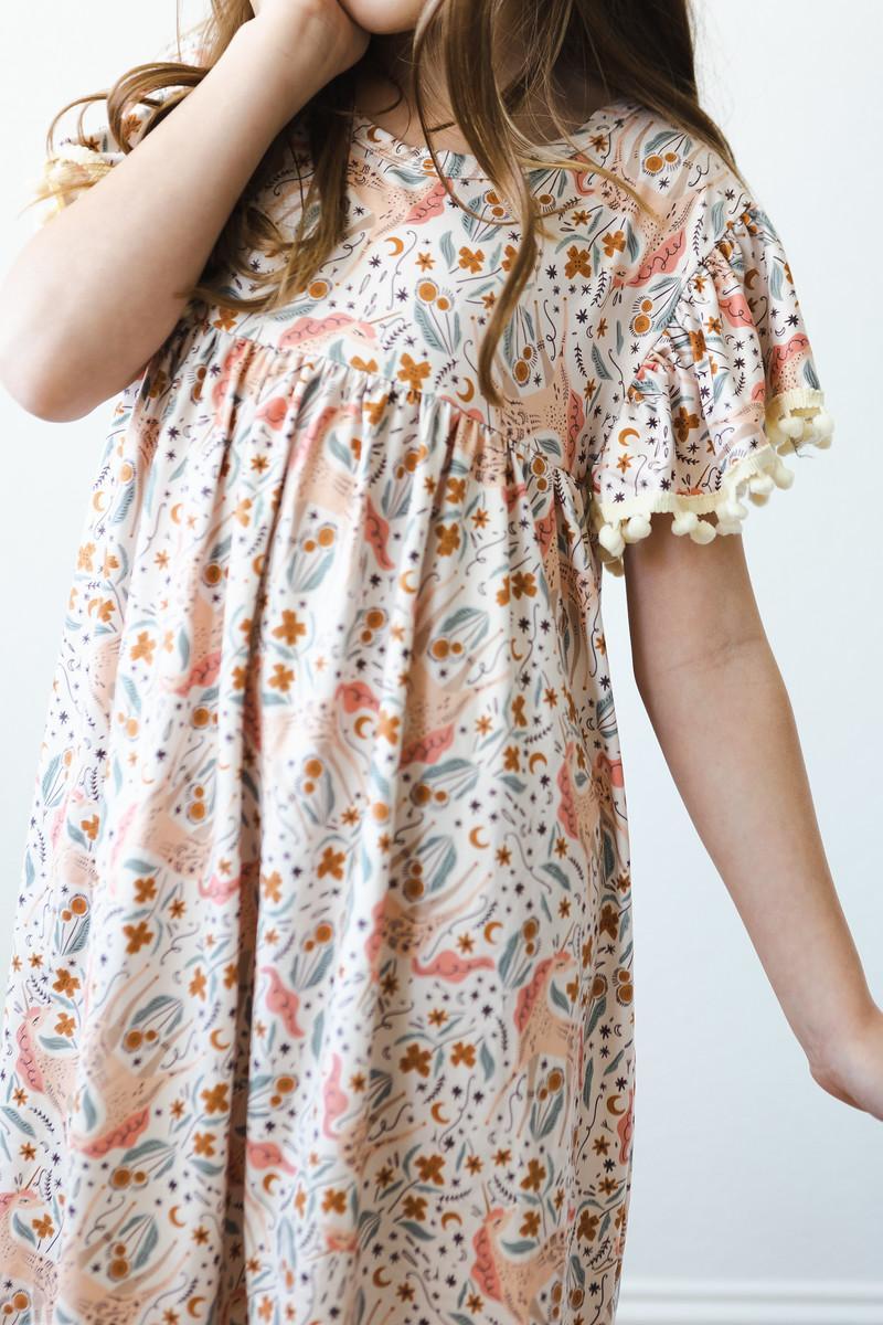 Mila & Rose ® Unicorn Soiree Pom Pom Dress — back view