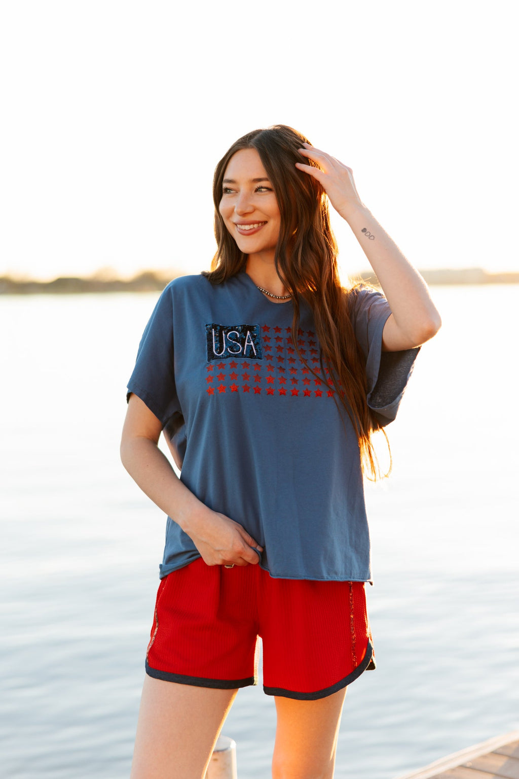 Grace+Emma USA Flag Glitter Stars Top — Grace+Emma branding close-up