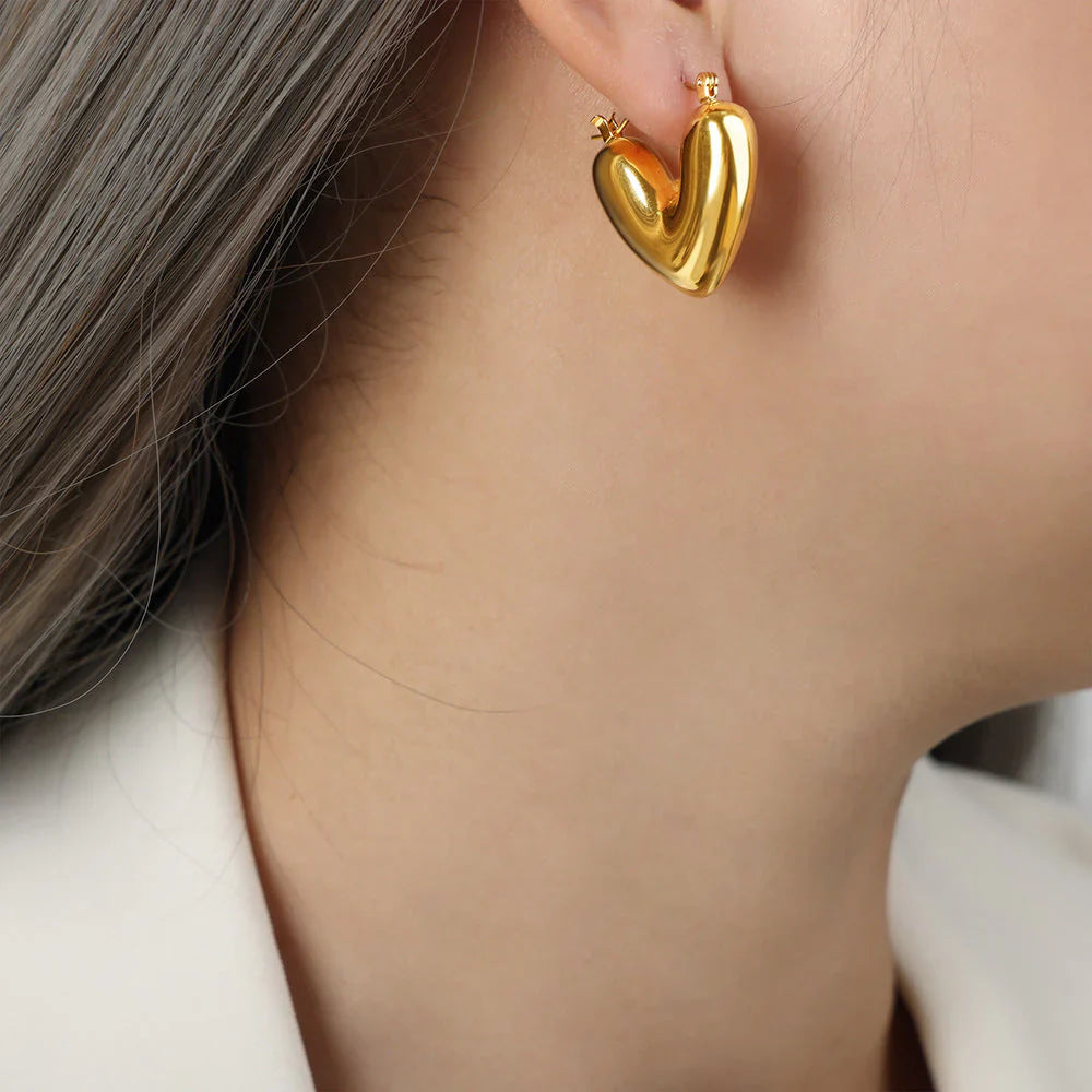 SORI STYLE Golden Puff Heart Hoop Earrings — side view