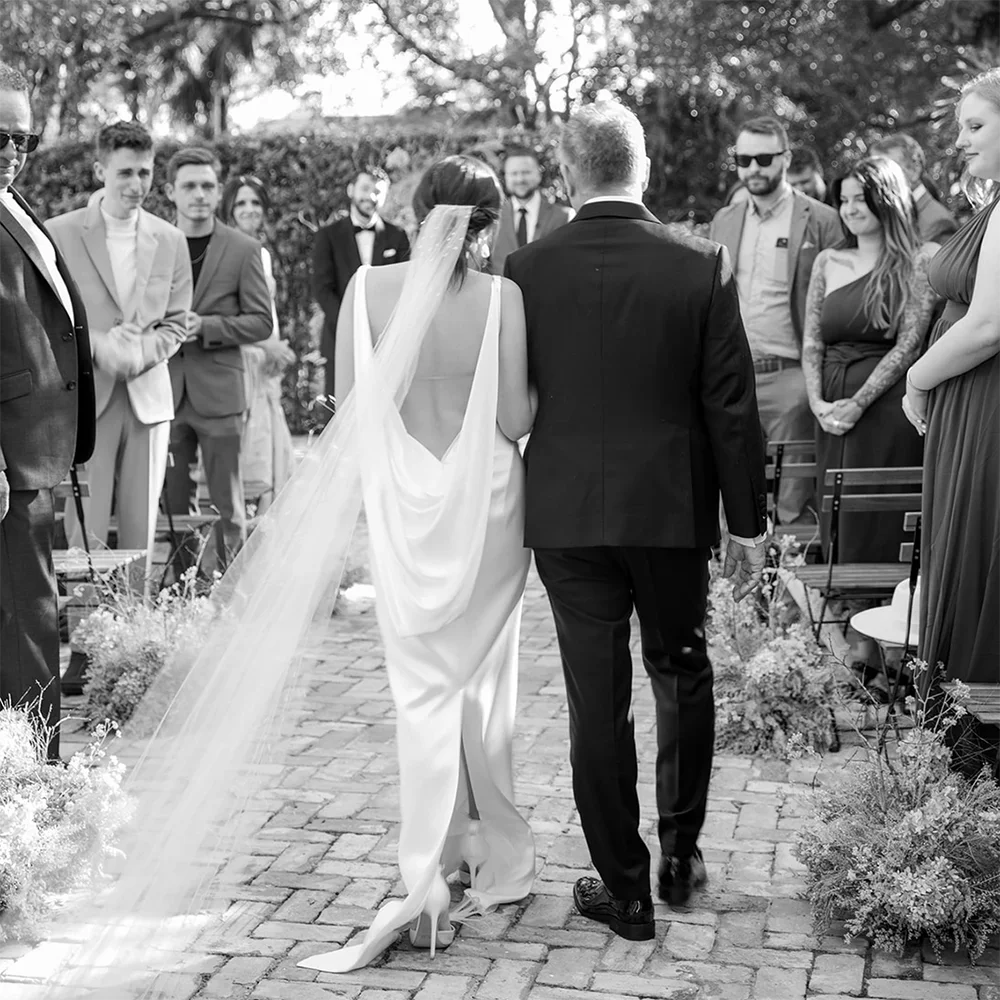 Envy NYC Envy NYC Belle Open Back Draped Satin Sheath Wedding Gown — detail shot 6