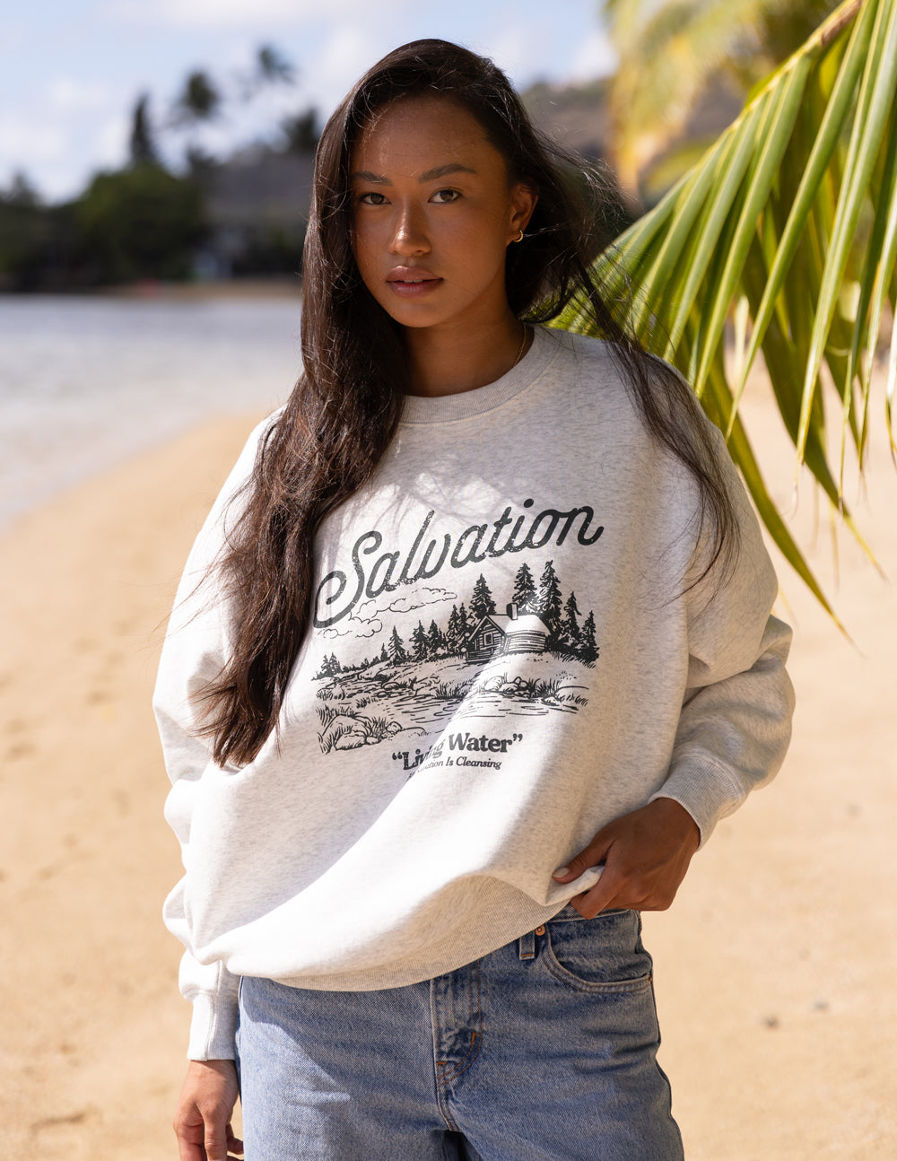 Elevated Faith Salvation Unisex Crewneck — Elevated Faith branding close-up