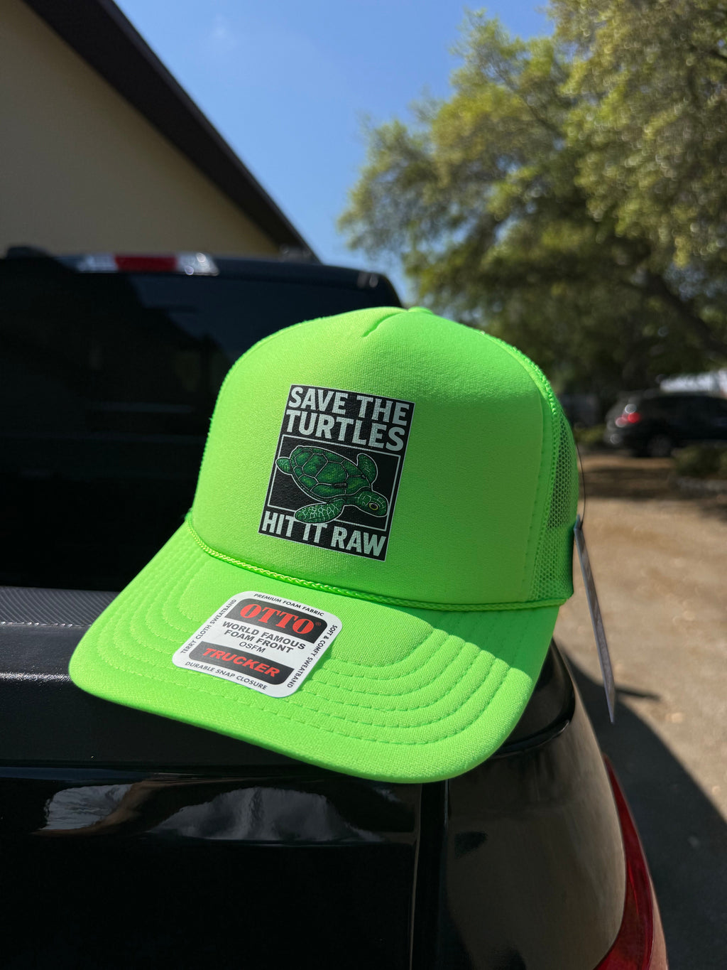 Luckless Outfitters Save The Turtles Trucker Hat — in-use photo