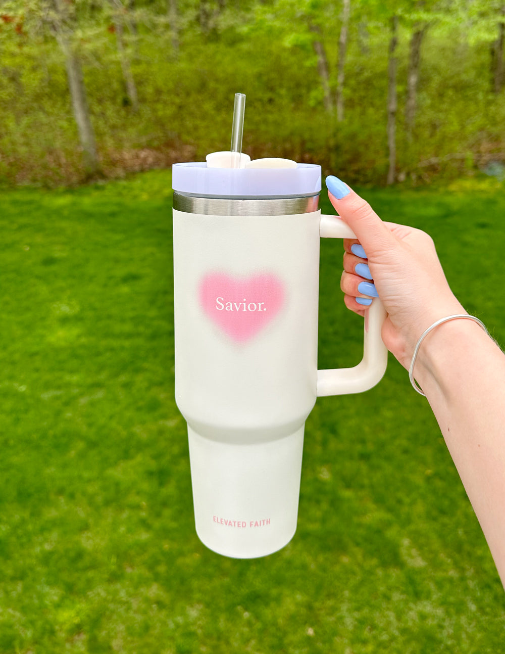 Elevated Faith Savior 40 oz Tumbler — in-use photo