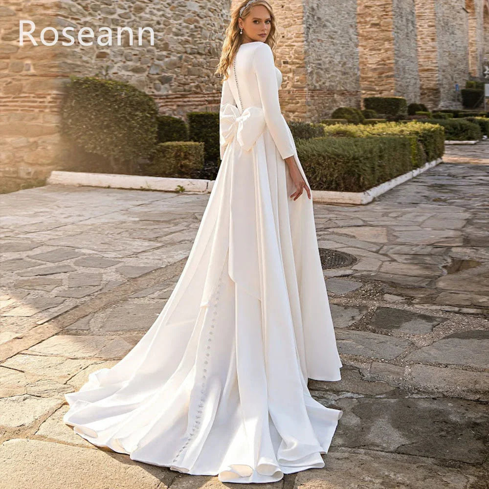 Envy NYC Envy NYC Julia A-line Ivory Satin Wedding Dress — Envy NYC branding close-up