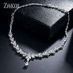 Envy NYC Brilliant Zirconia Leaf Necklace, Earrings & Bracelet Set — Envy NYC branding close-up