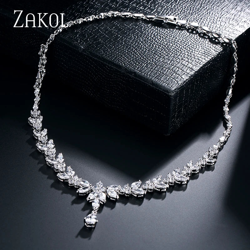 Envy NYC Brilliant Zirconia Leaf Necklace, Earrings & Bracelet Set — Envy NYC branding close-up
