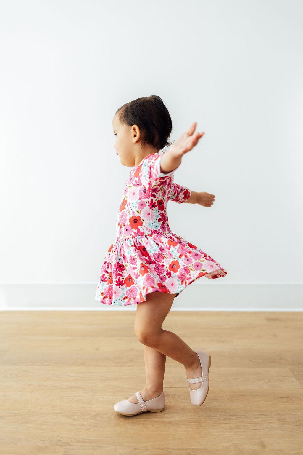 Mila & Rose ® Secret Garden 3/4 Sleeve Twirl Bodysuit — in-use photo