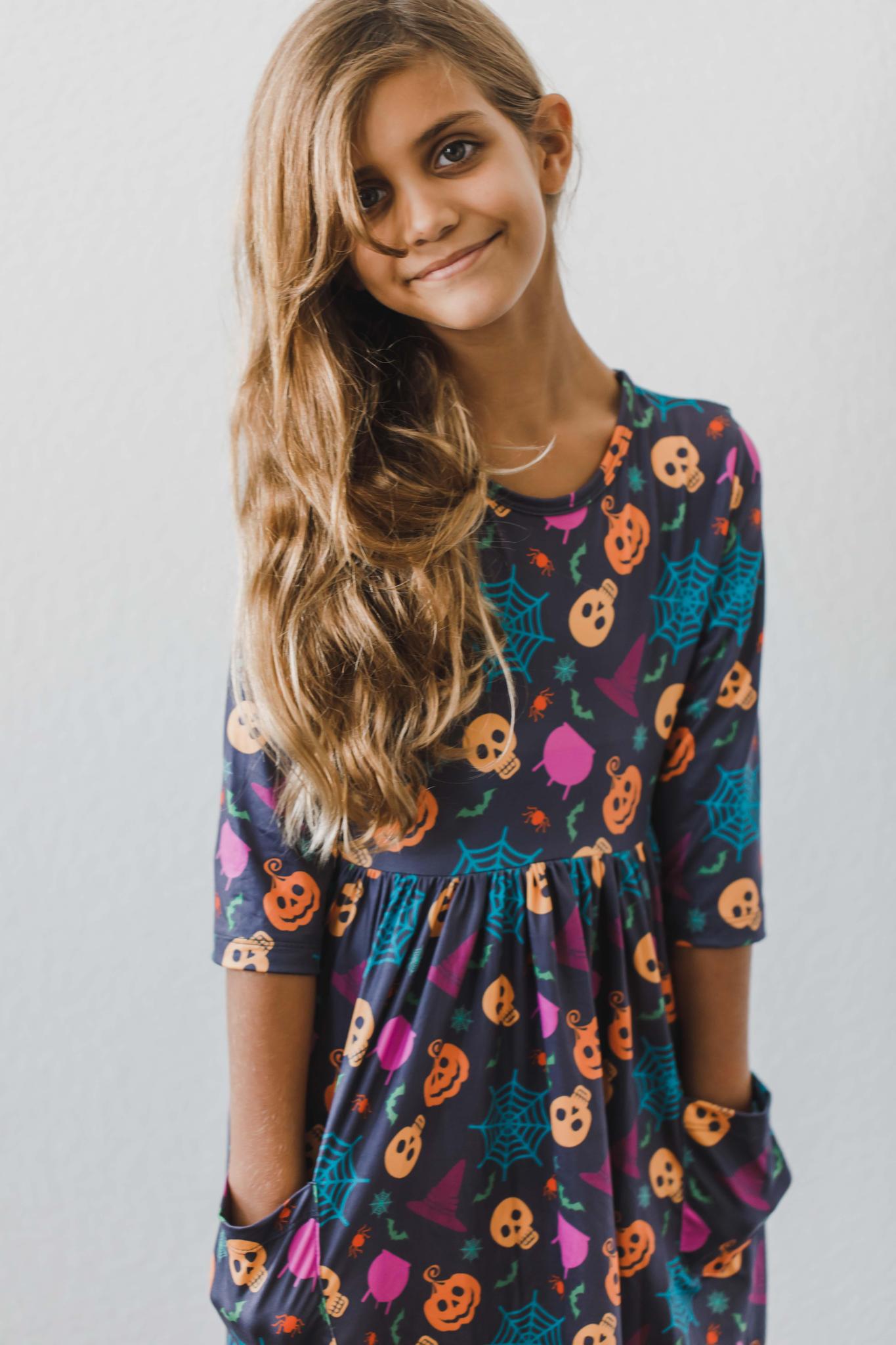 Mila & Rose ® Skeleton Web 3/4 Sleeve Pocket Twirl Dress — side view