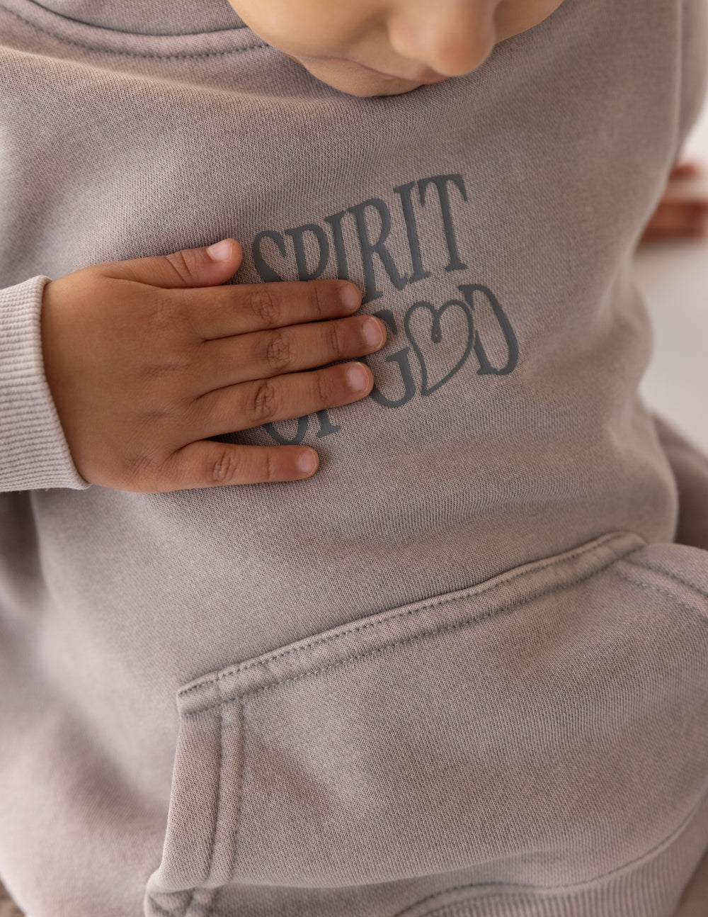 Elevated Faith Spirit of God Kids Hoodie — detail close-up