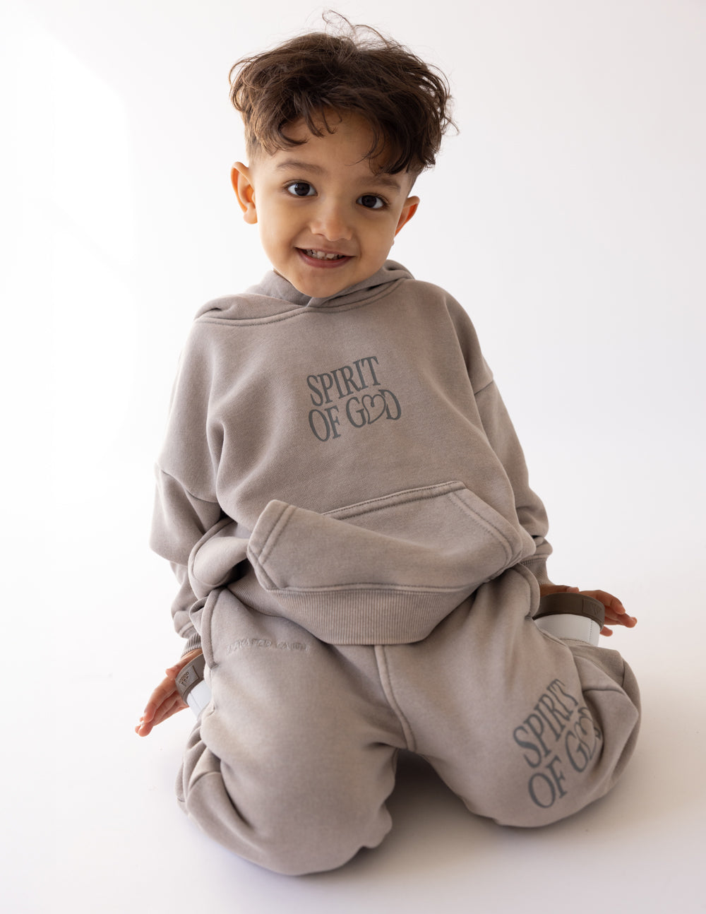 Elevated Faith Spirit of God Kids Hoodie — lifestyle context