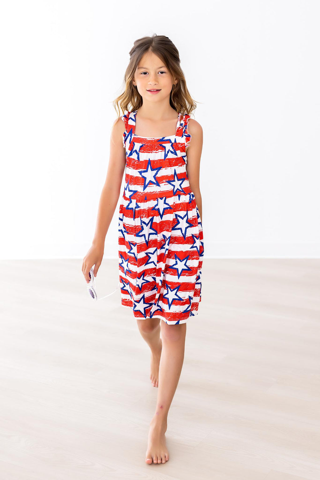 Mila & Rose ® Stars & Stripes Ruffle Cross Back Dress — detail close-up