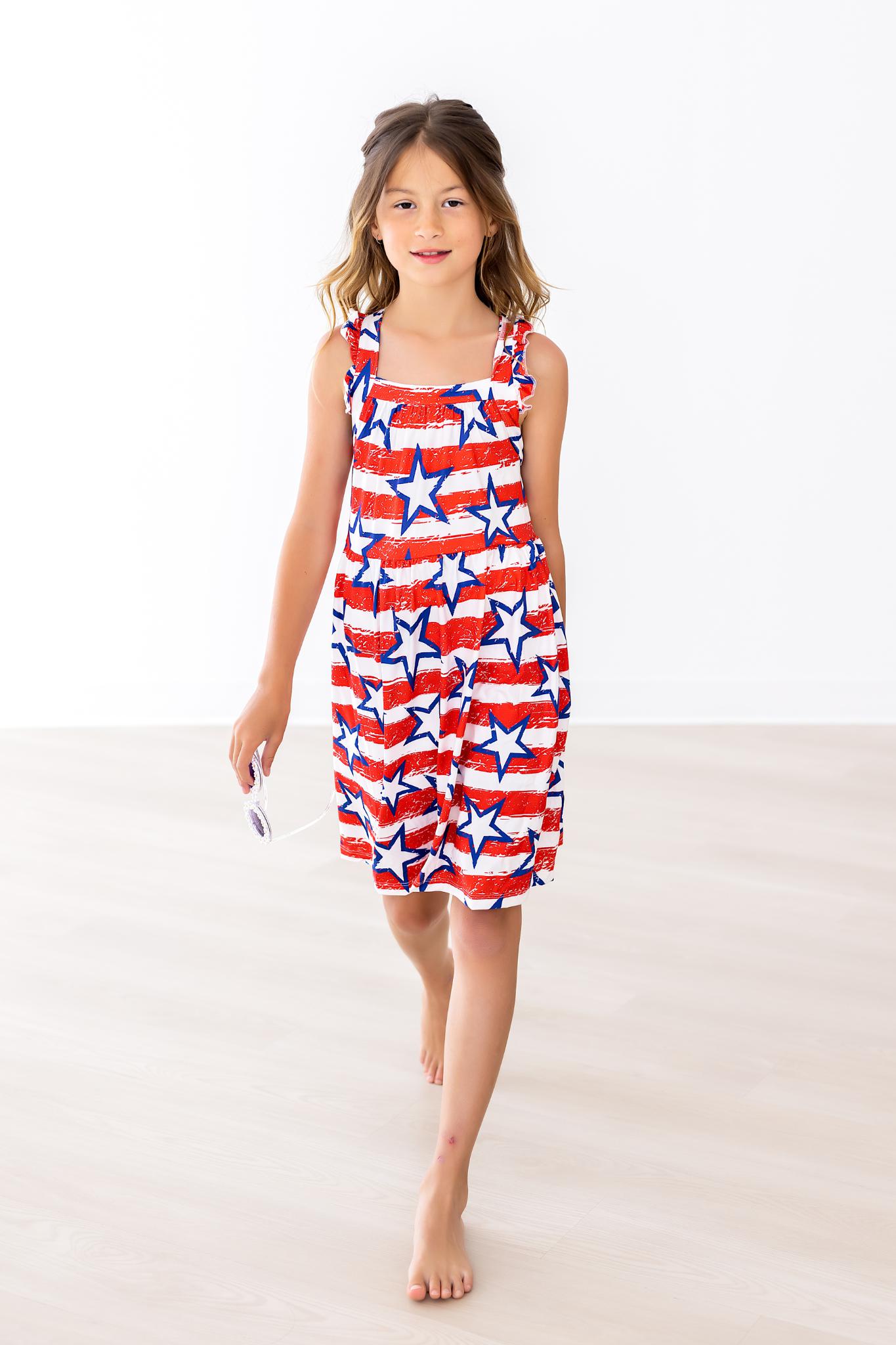 Mila & Rose ® Stars & Stripes Ruffle Cross Back Dress — detail close-up