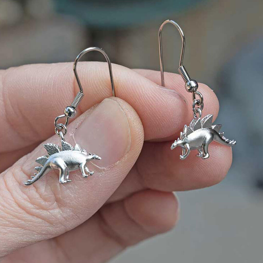 Princess Awesome & Boy Wonder Pteradactyl & Stegosaurus Earrings — Princess Awesome & Boy Wonder branding close-up