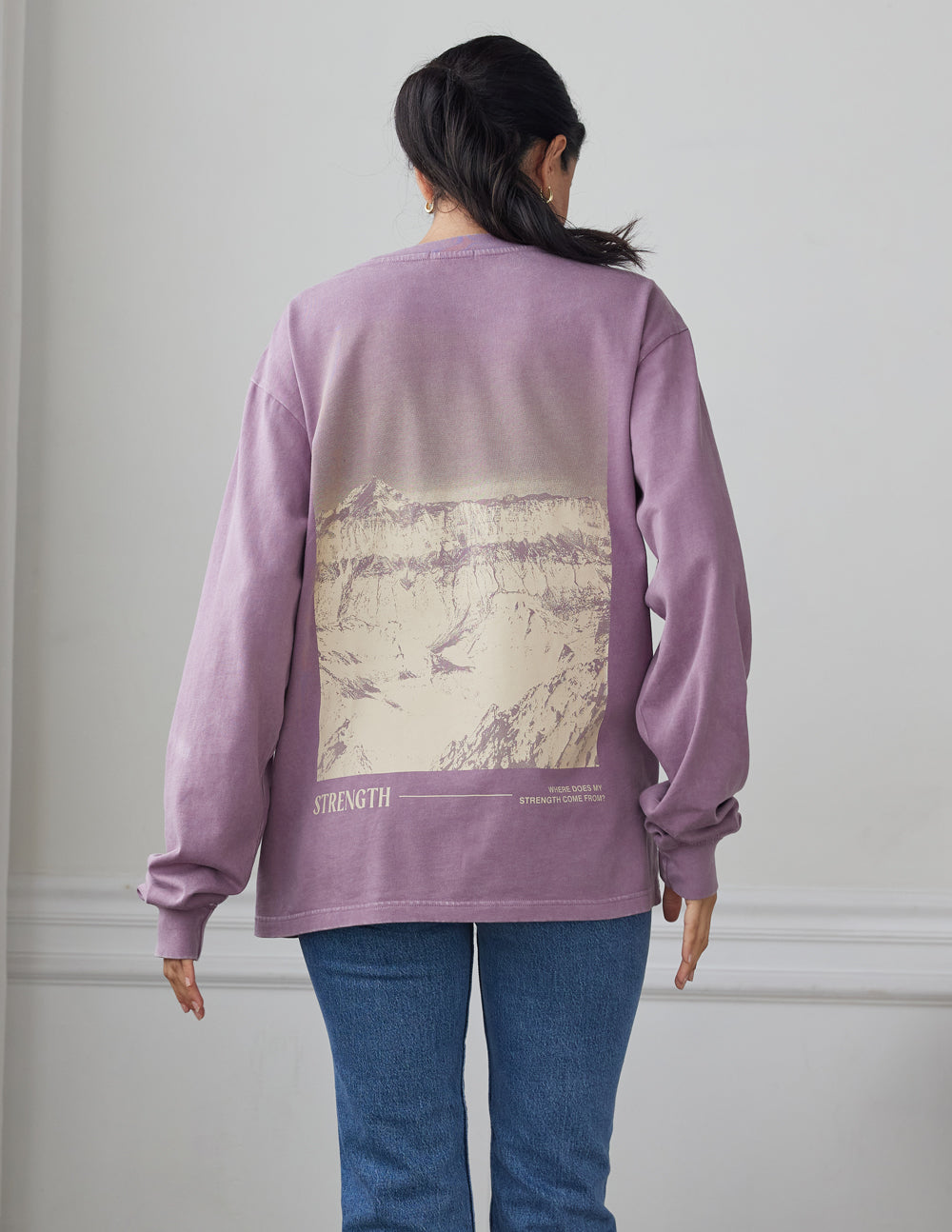 Elevated Faith Strength LS Unisex Tee — lifestyle context