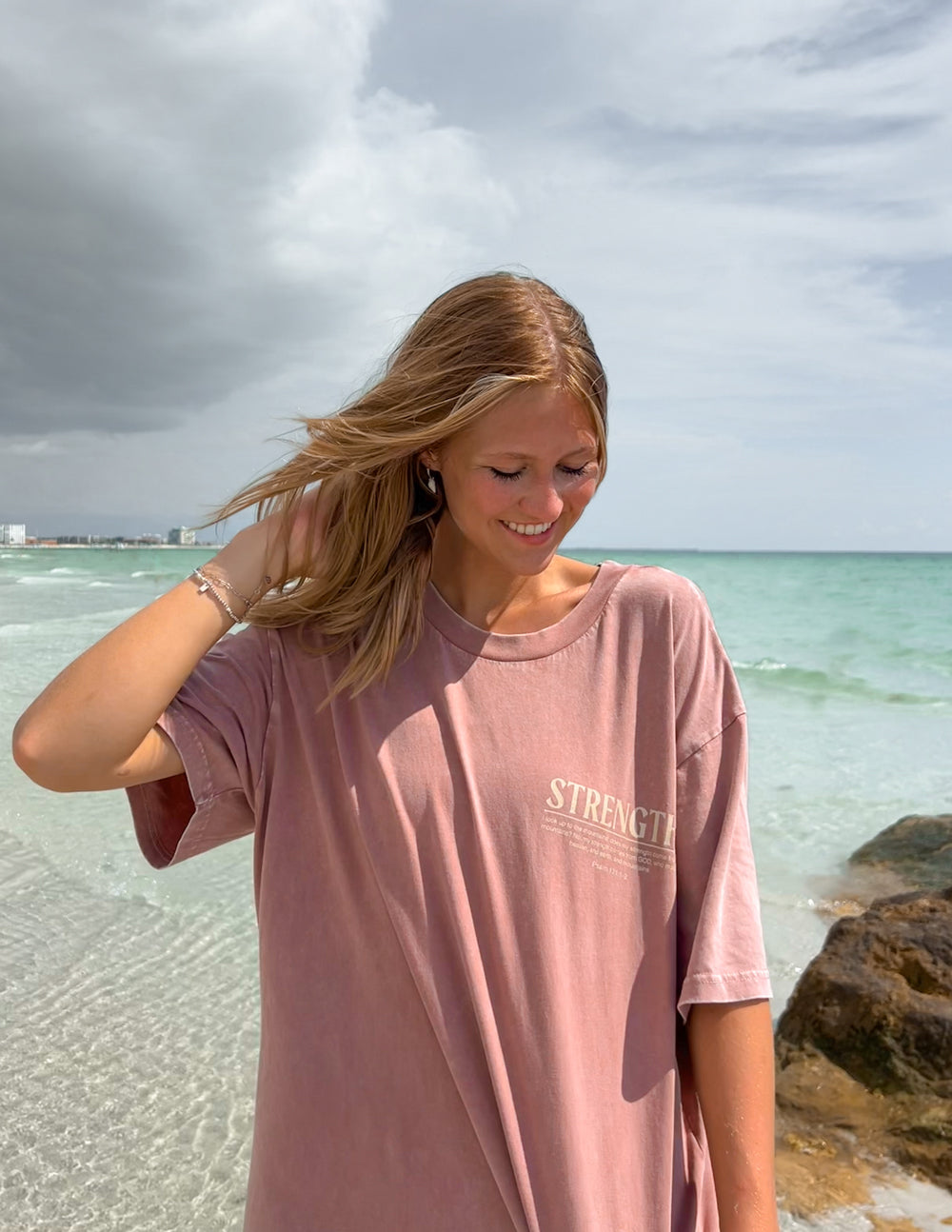 Elevated Faith Strength Unisex Tee — in-use photo