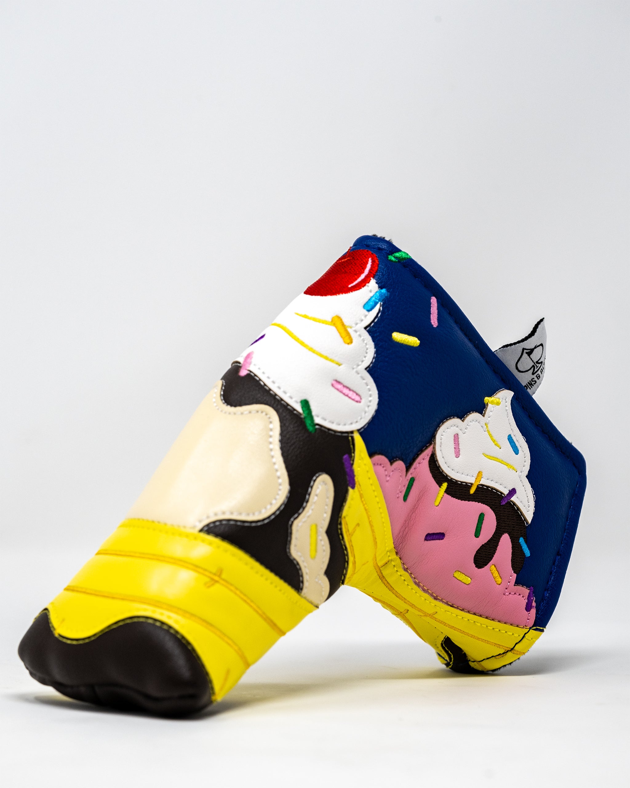 Pins and Aces Banana Split - Blade Putter Cover — detail close-up