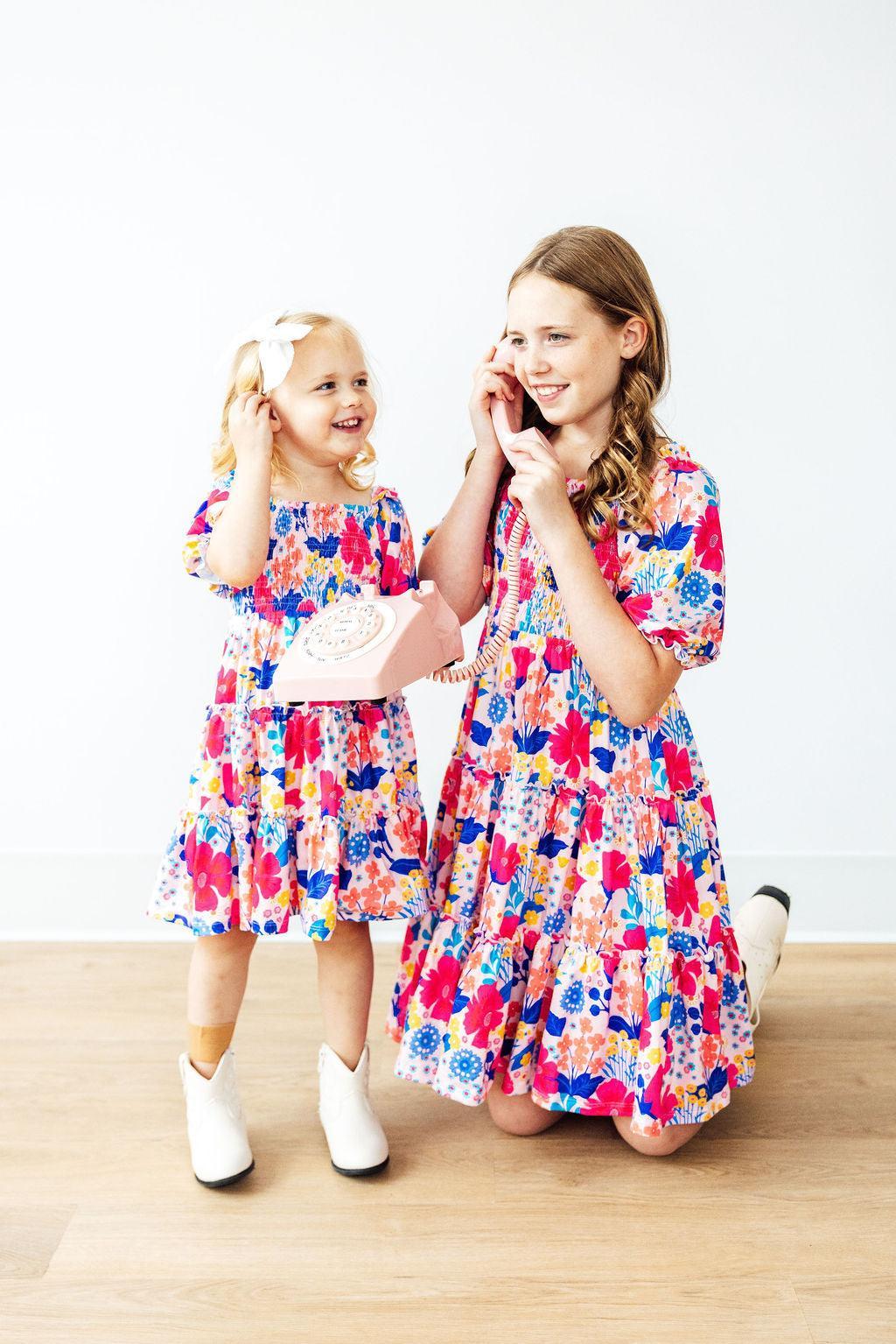 Mila & Rose ® Sunshine Garden Smocked Ruffle Dress — in-use photo