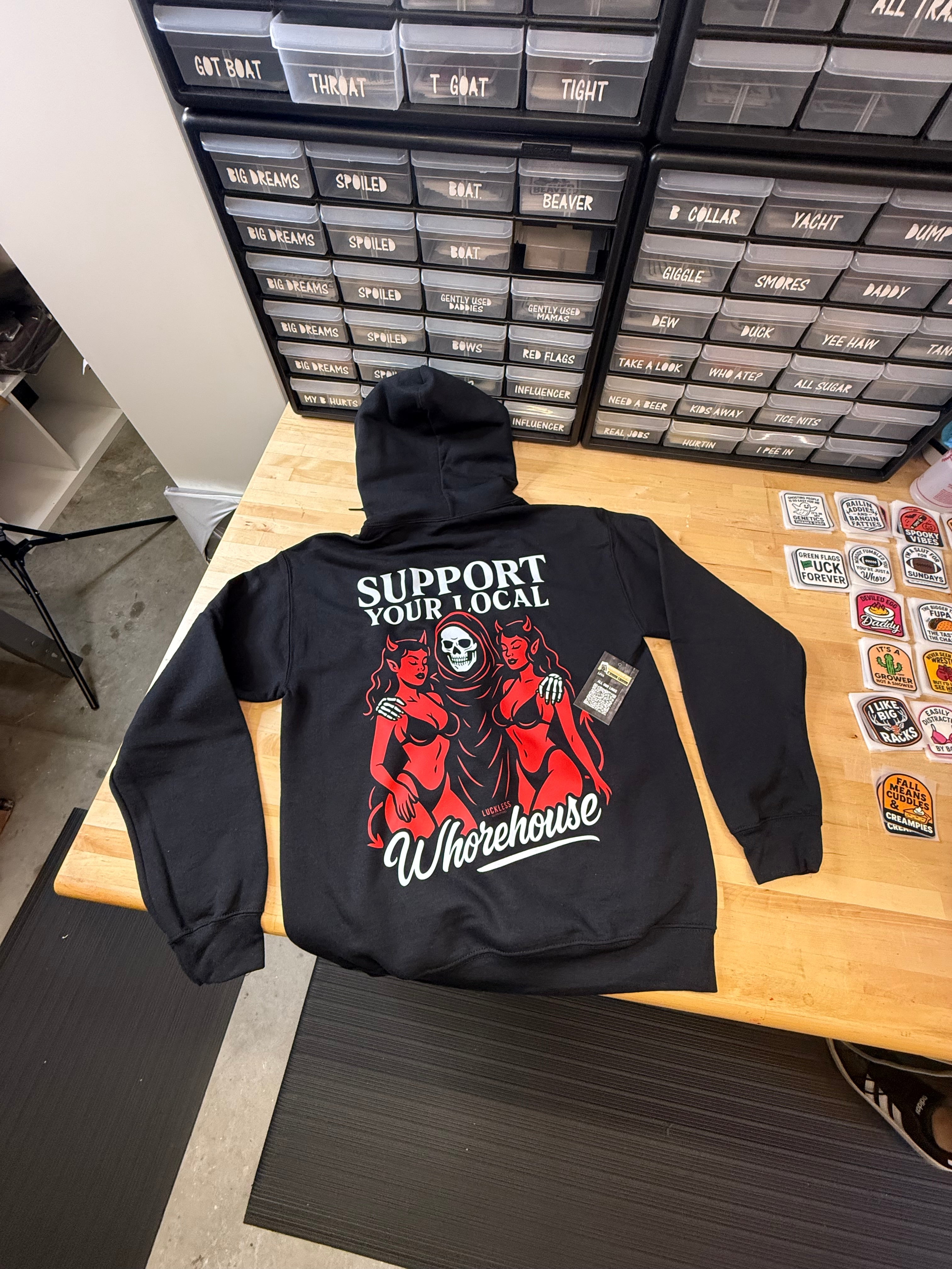 Luckless Outfitters Support Your Local Whorehouse Hoodie — detail close-up