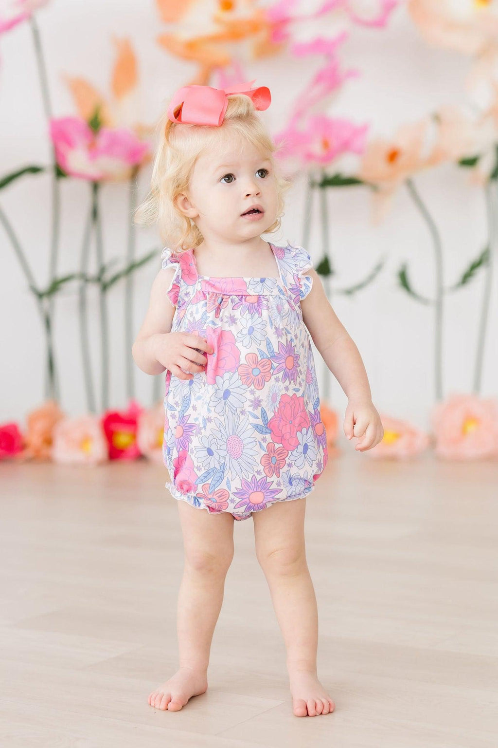 Mila & Rose ® Sweet Springtime Ruffle Cross Back Romper — detail close-up