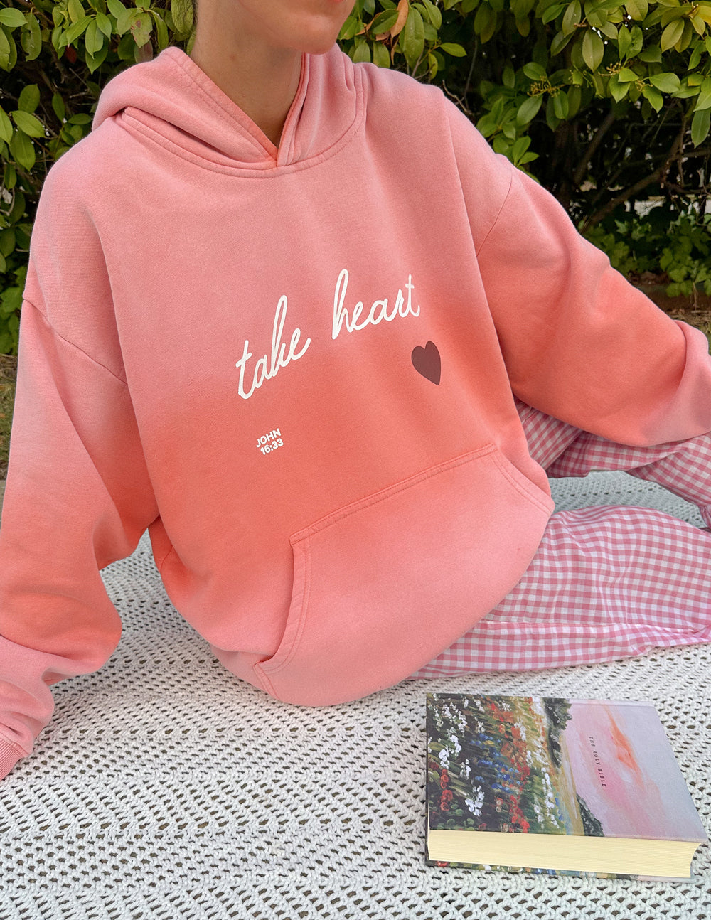 Elevated Faith Take Heart Unisex Hoodie — lifestyle worn / used context