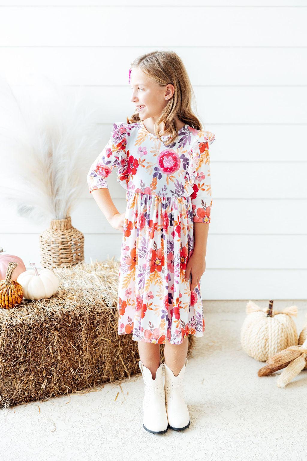 Mila & Rose ® Tangerine Leaves 3/4 Sleeve Ruffle Twirl Dress — lifestyle context