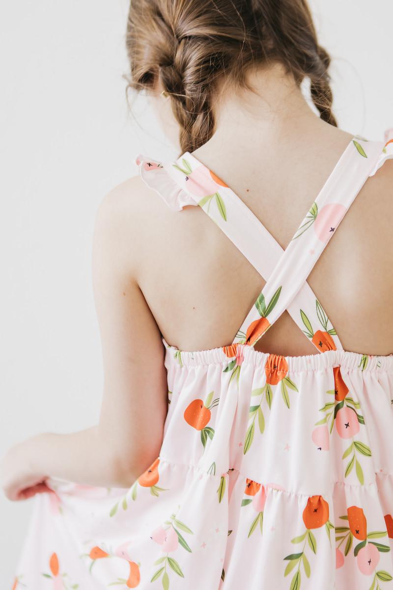 Mila & Rose ® Tangerine Ruffle Cross Back Dress — detail close-up