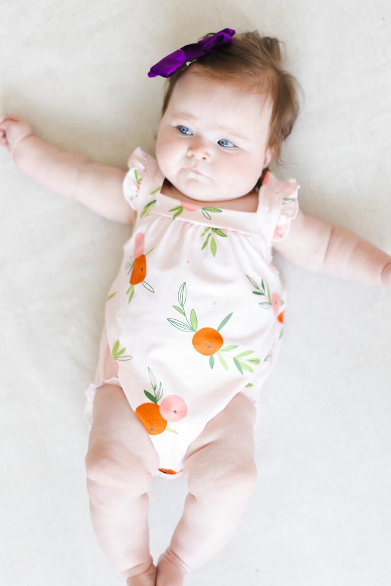 Mila & Rose ® Tangerine Ruffle Cross Back Romper — alternative angle