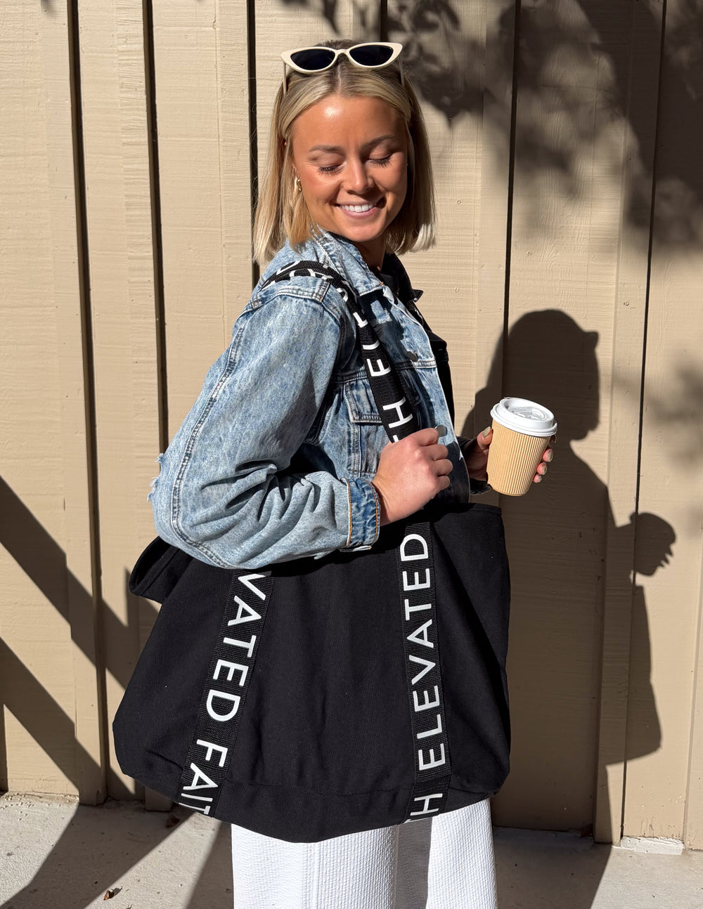 Elevated Faith The Large Everyday Black Tote — lifestyle context