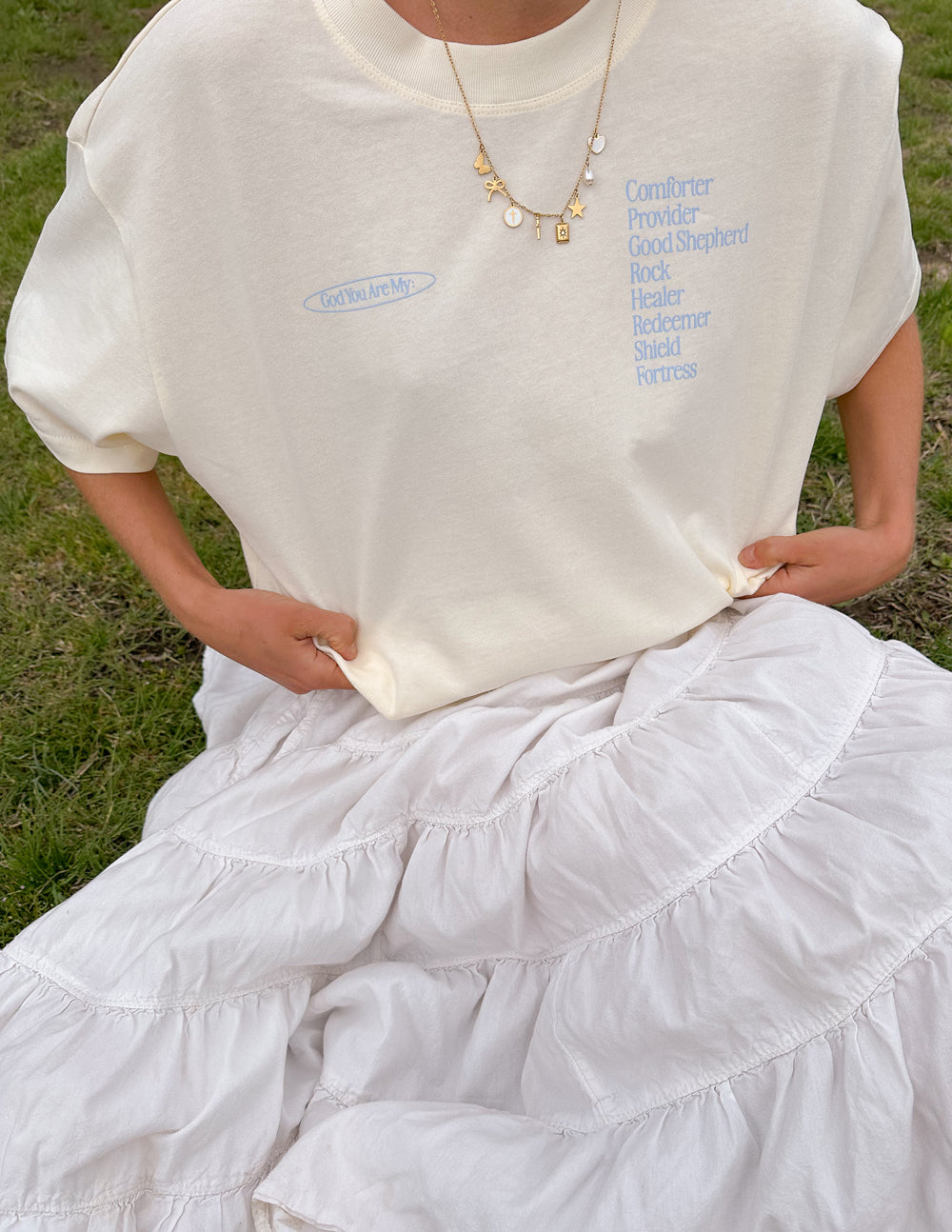 Elevated Faith Transformation Charm Necklace — Elevated Faith branding close-up