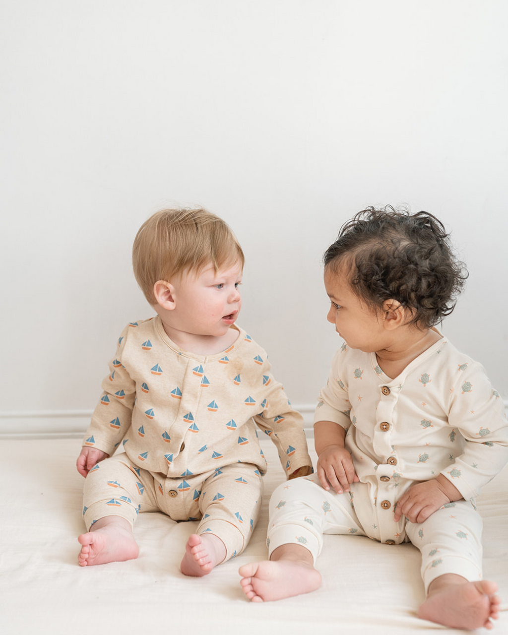 Dear Hayden Quinn Magnetic Playsuit in Turtles — lifestyle context
