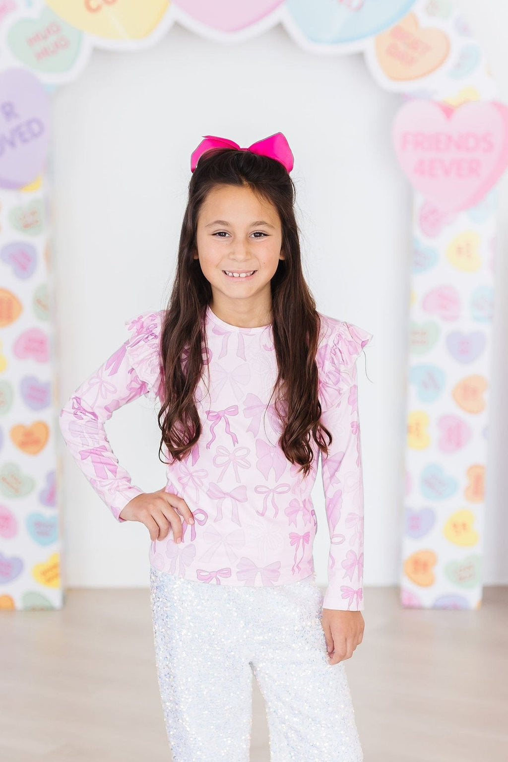Mila & Rose ® Twinkle Ties L/S Ruffle Tee — back view